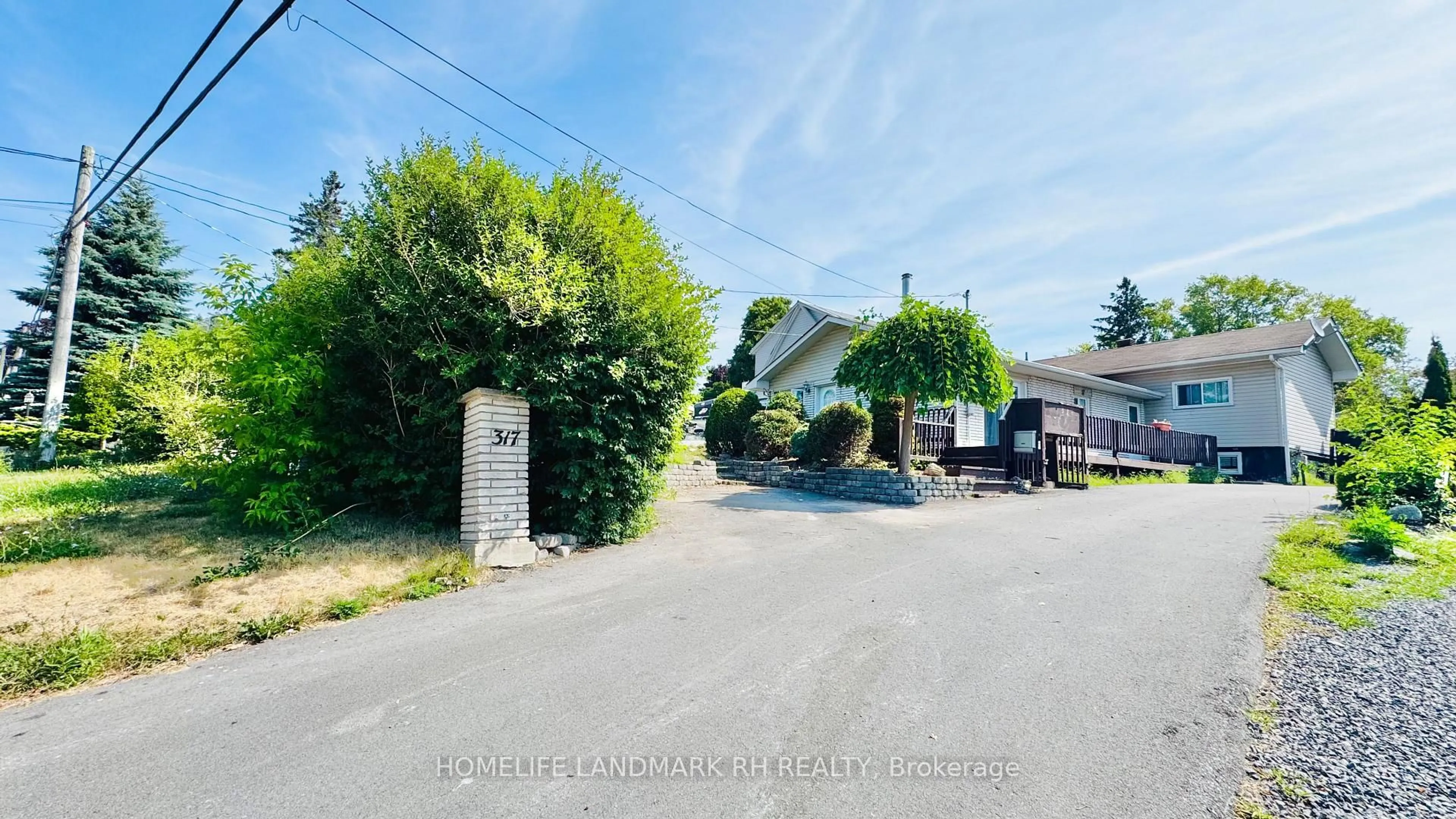 A pic from outside/outdoor area/front of a property/back of a property/a pic from drone, street for 317 Sidney St, Quinte West Ontario K8V 2V1