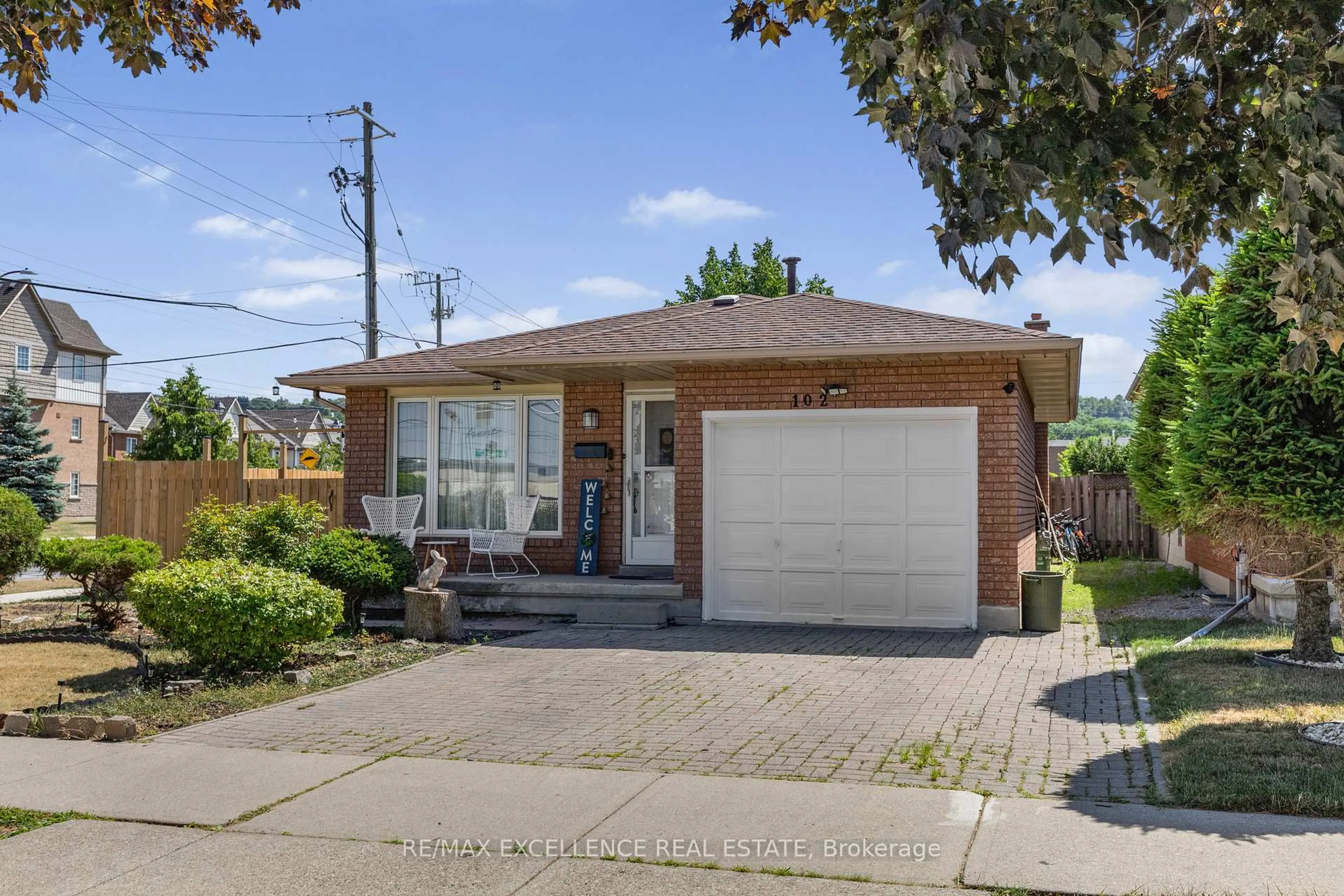 Home with brick exterior material, street for 102 Juniper Dr, Hamilton Ontario L8E 4G6