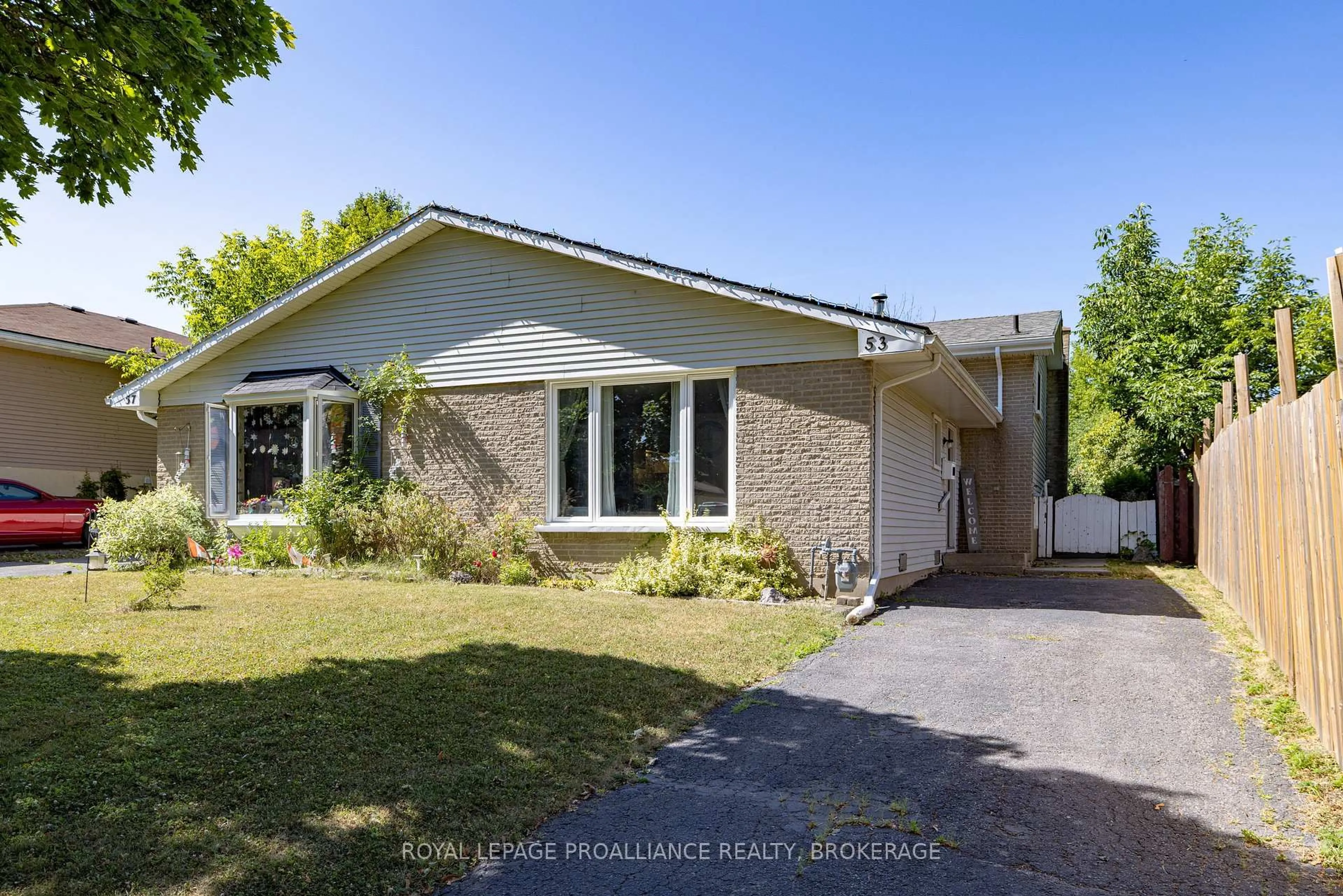 A pic from outside/outdoor area/front of a property/back of a property/a pic from drone, street for 53 Abbey Dale Crt, Kingston Ontario K7K 5W8