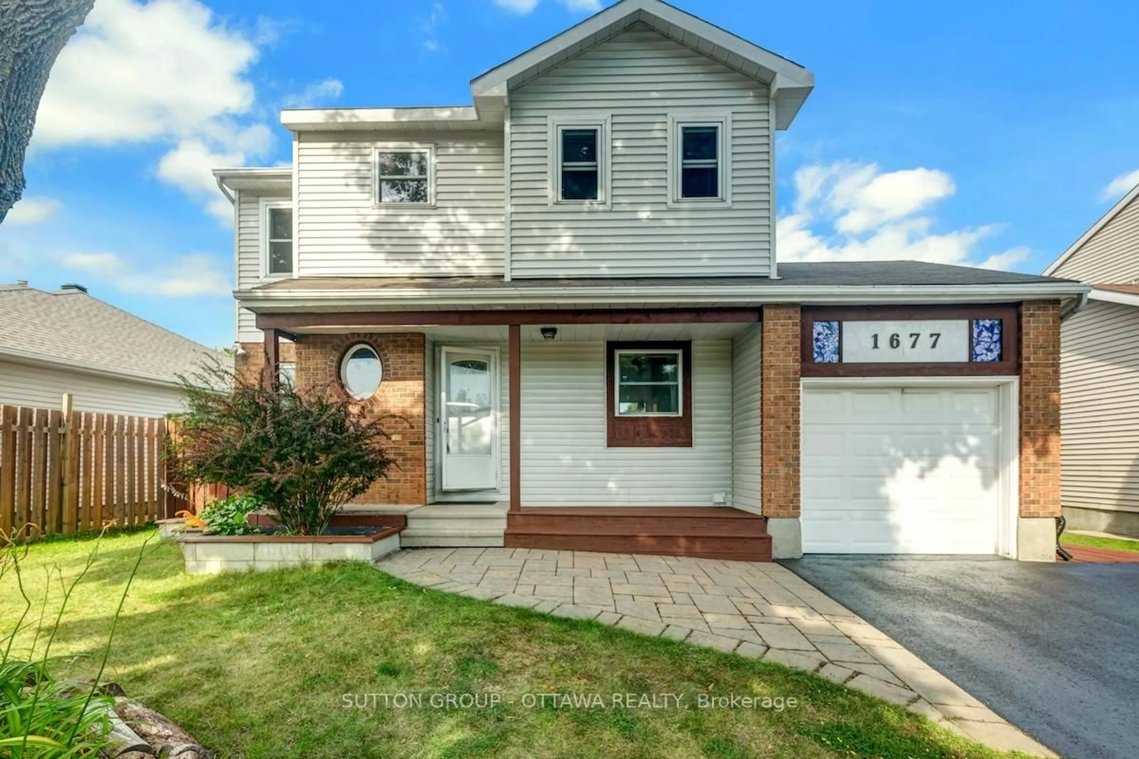 Home with vinyl exterior material, street for 1677 Bottriell Way, Orleans Ontario K4A 1W1