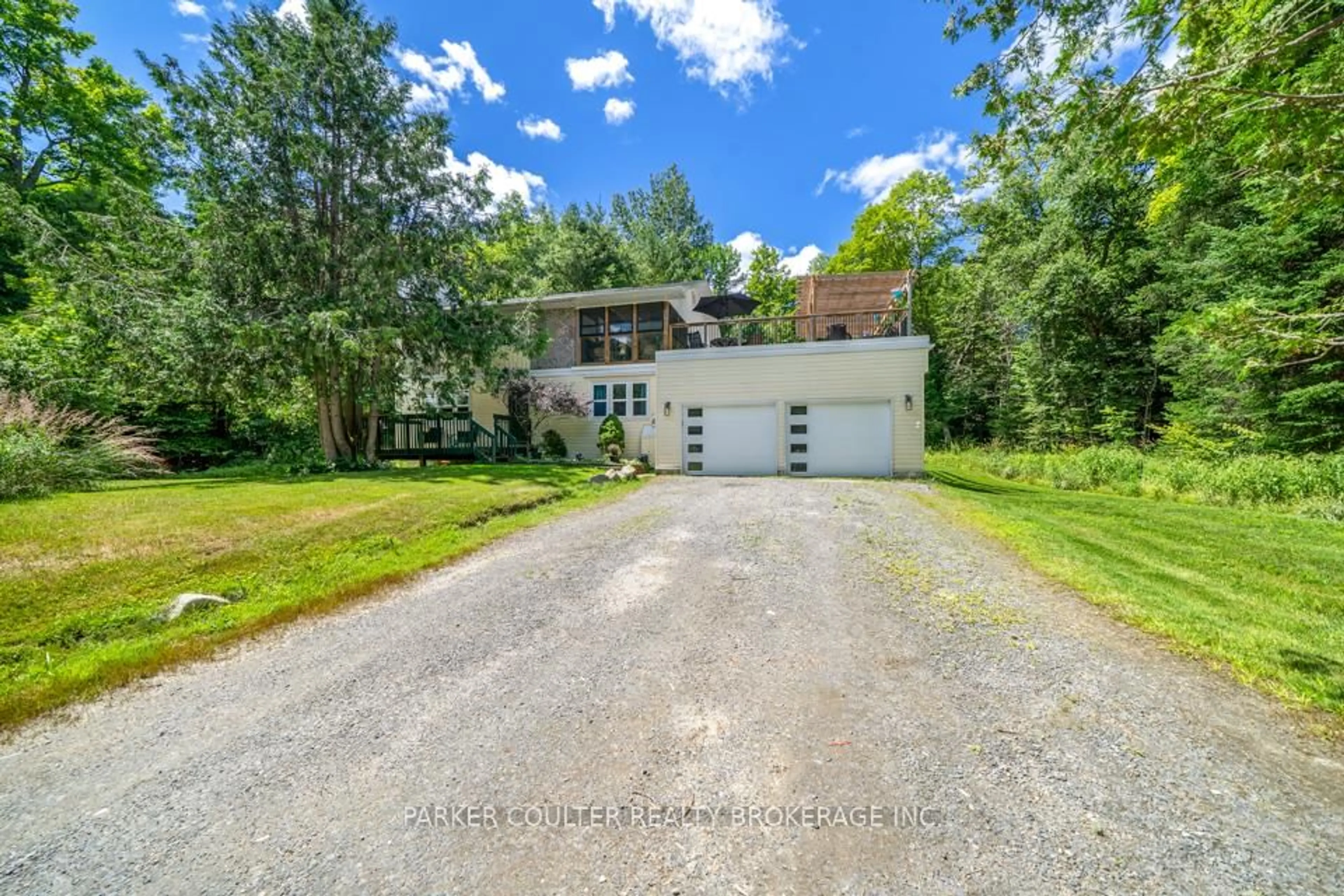 A pic from outside/outdoor area/front of a property/back of a property/a pic from drone, unknown for 256 Woodland Dr, Huntsville Ontario P1H 1A6