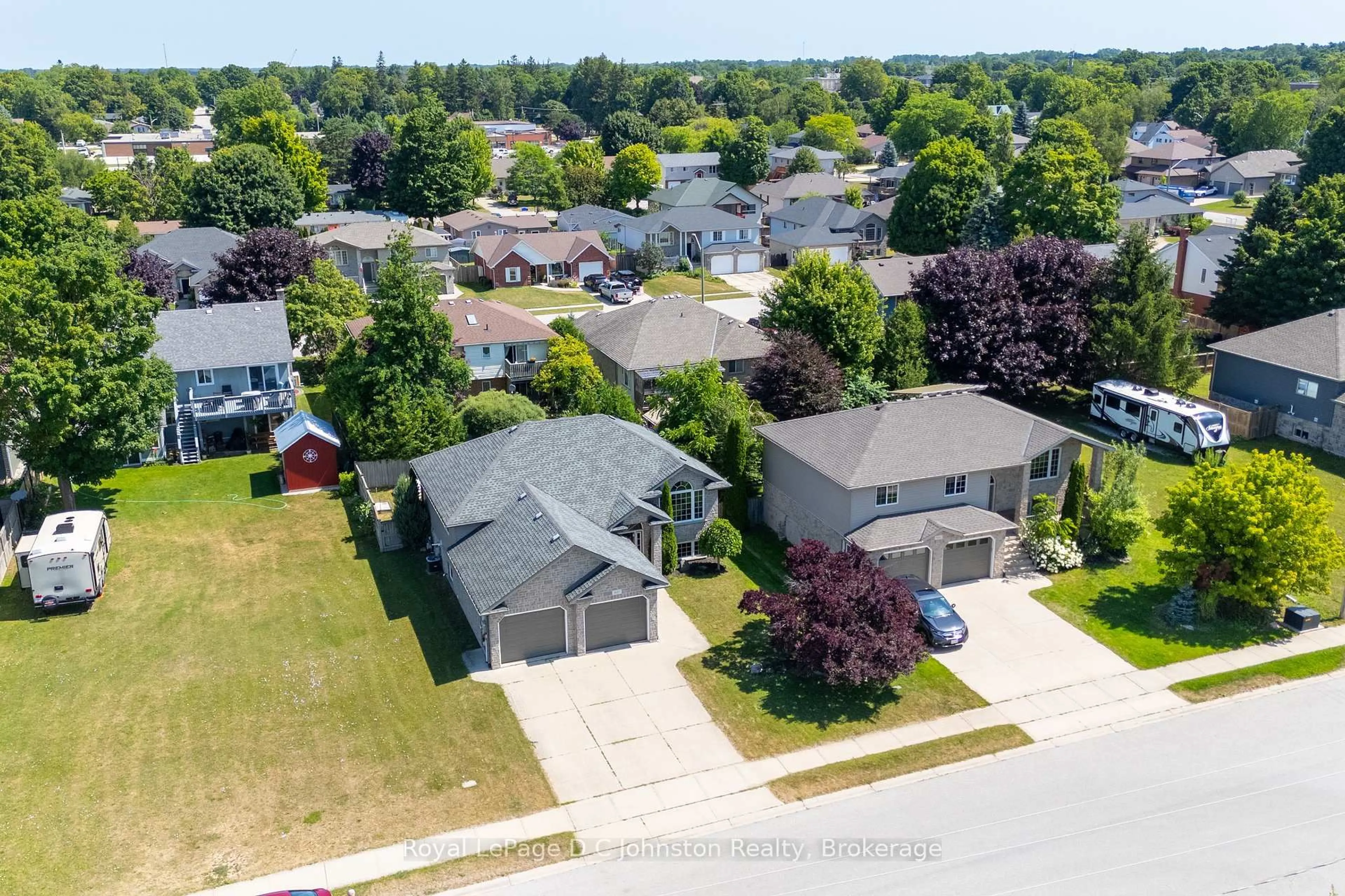 A pic from outside/outdoor area/front of a property/back of a property/a pic from drone, street for 497 Buckby Lane, Saugeen Shores Ontario N0H 2C1