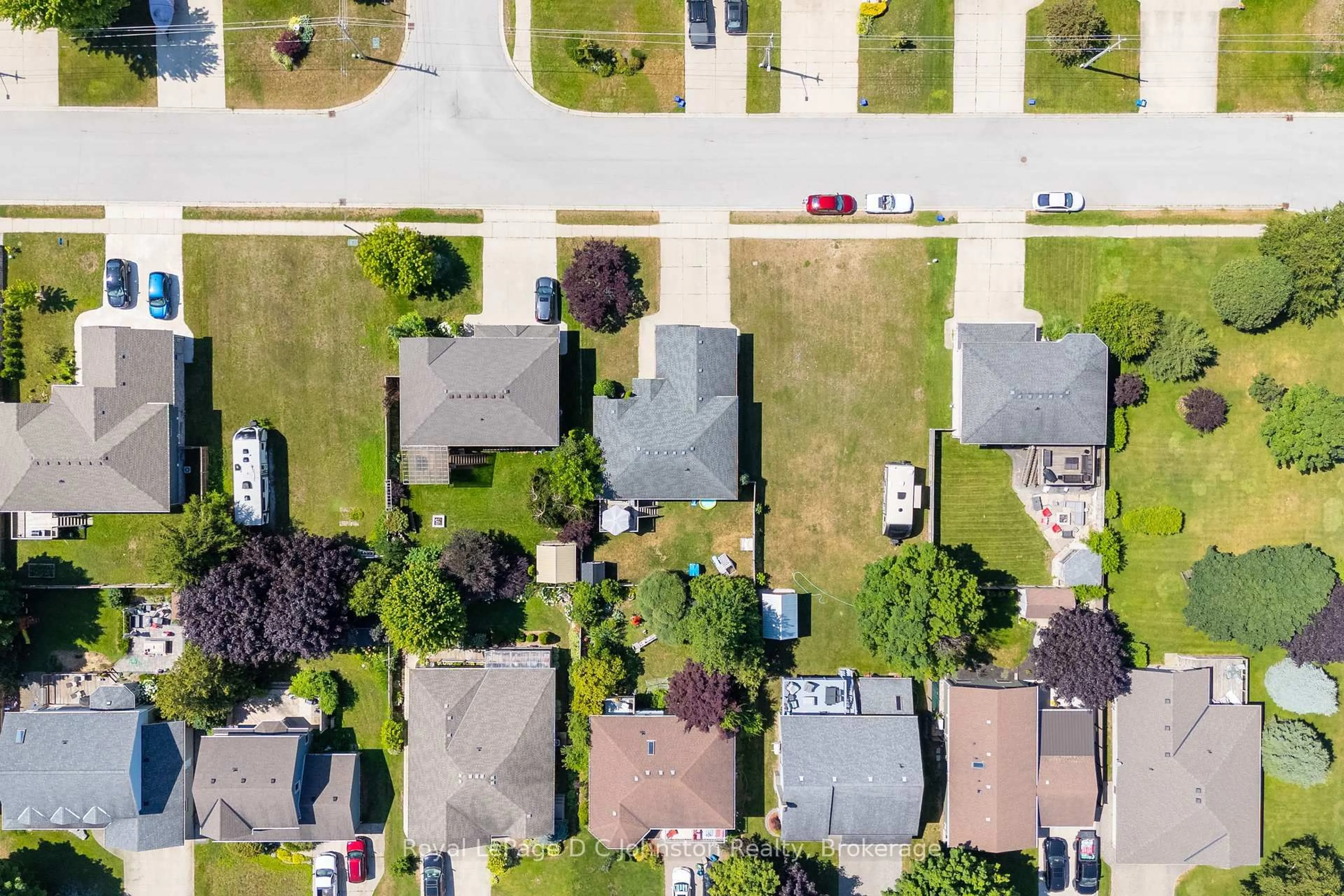A pic from outside/outdoor area/front of a property/back of a property/a pic from drone, street for 497 Buckby Lane, Saugeen Shores Ontario N0H 2C1
