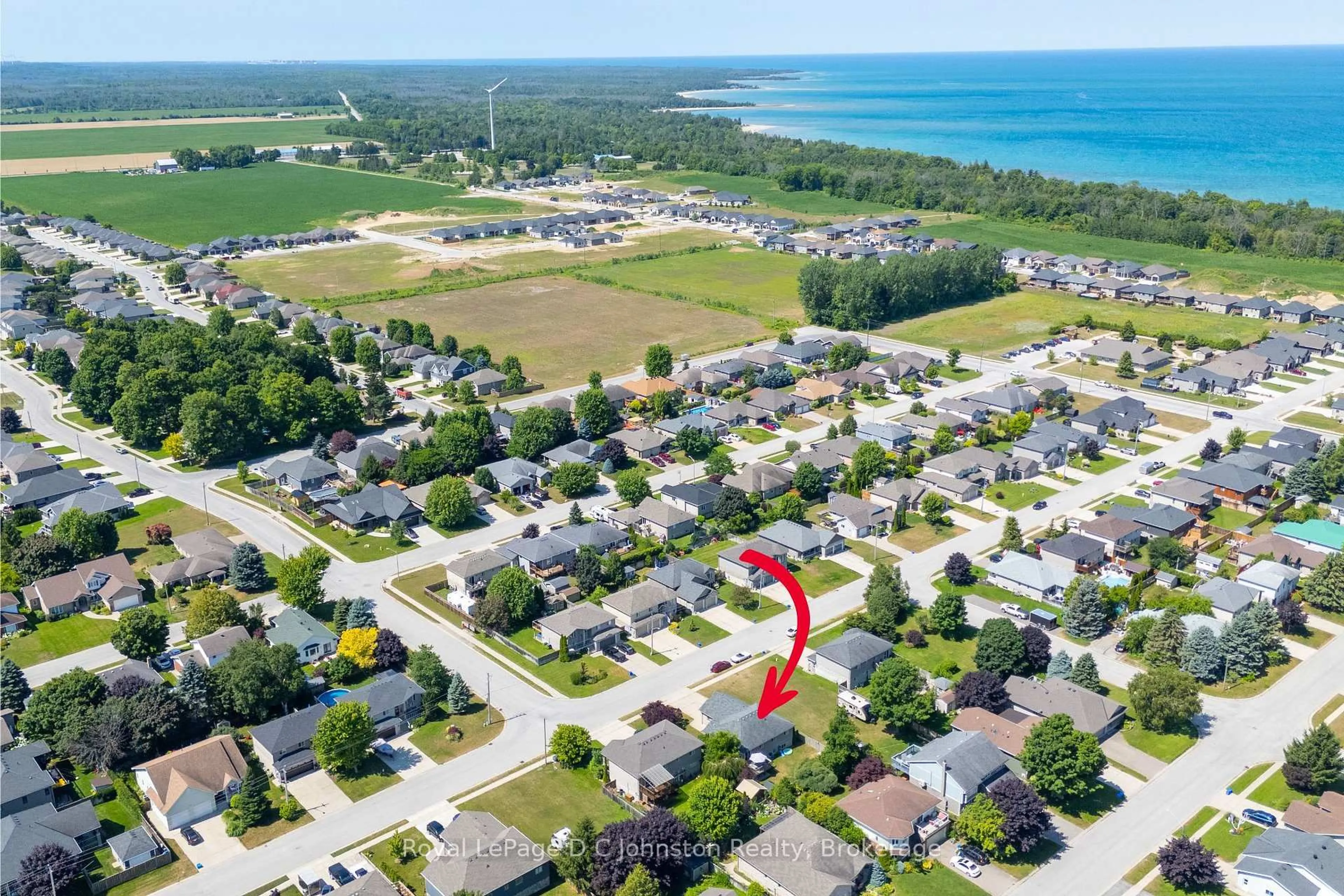 A pic from outside/outdoor area/front of a property/back of a property/a pic from drone, water/lake/river/ocean view for 497 Buckby Lane, Saugeen Shores Ontario N0H 2C1