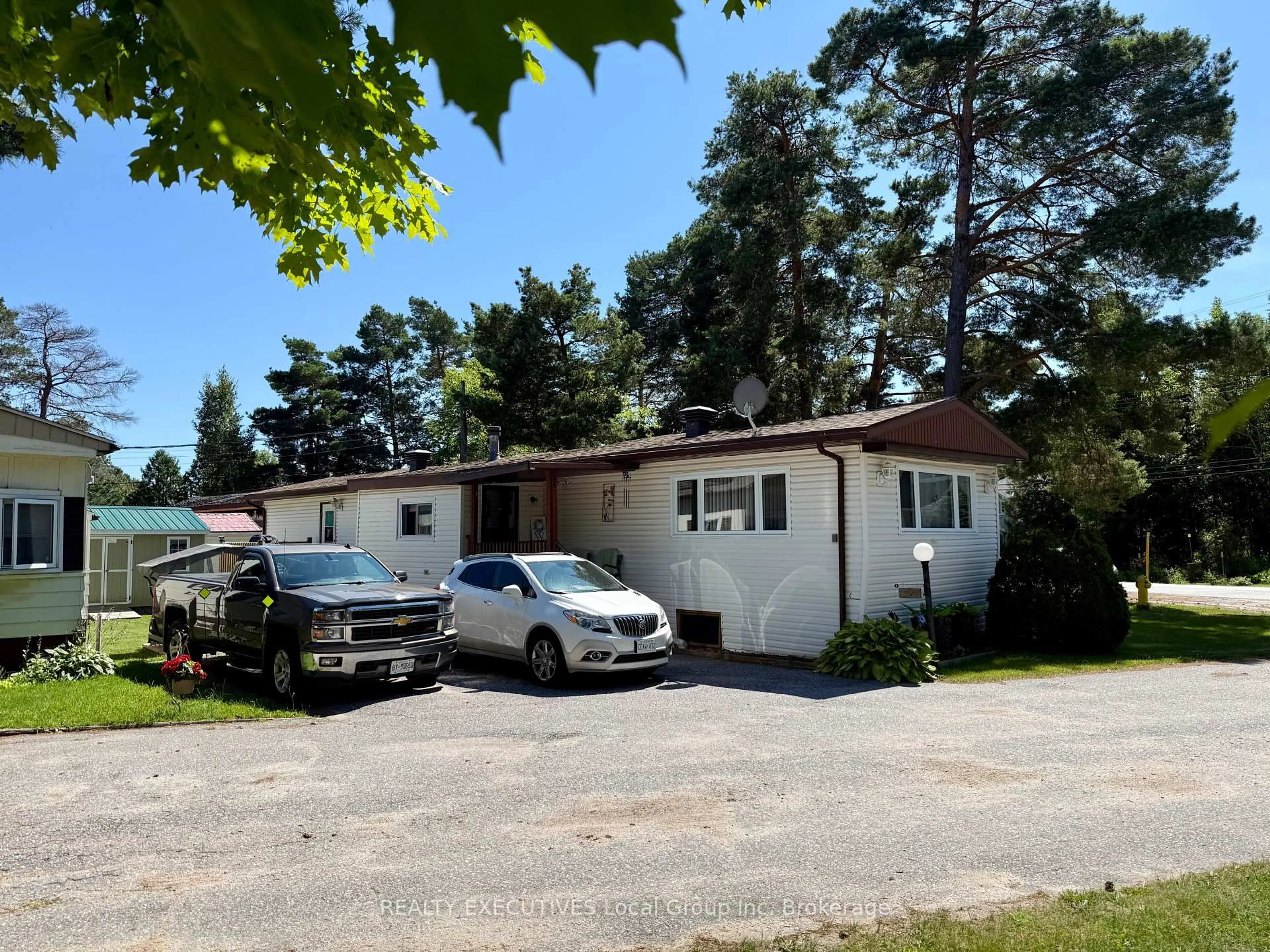 A pic from outside/outdoor area/front of a property/back of a property/a pic from drone, street for 208 Little Down Lane #9, North Bay Ontario P1B 8G2