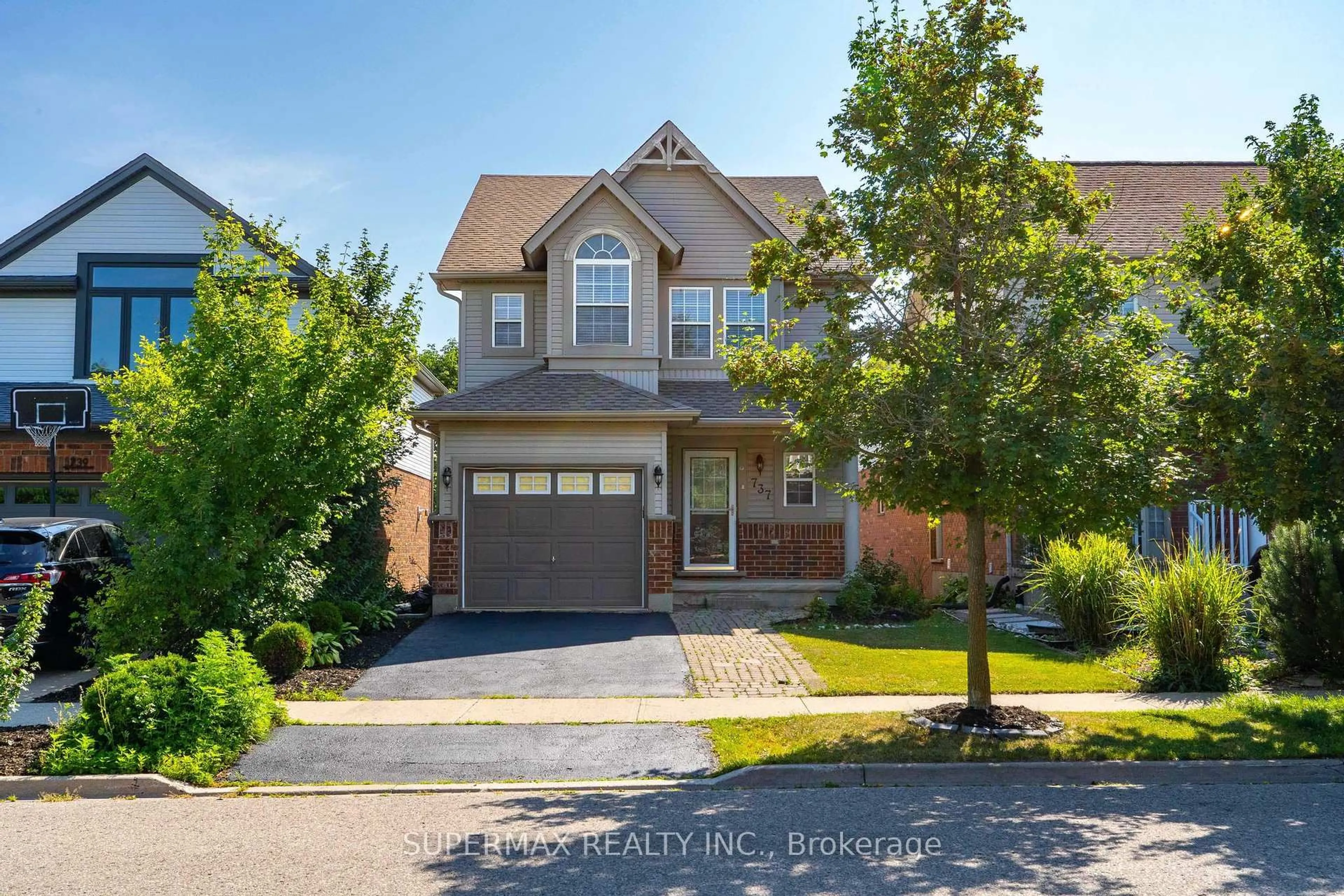 Home with brick exterior material, street for 737 Grand Banks Dr, Waterloo Ontario N2K 4N2