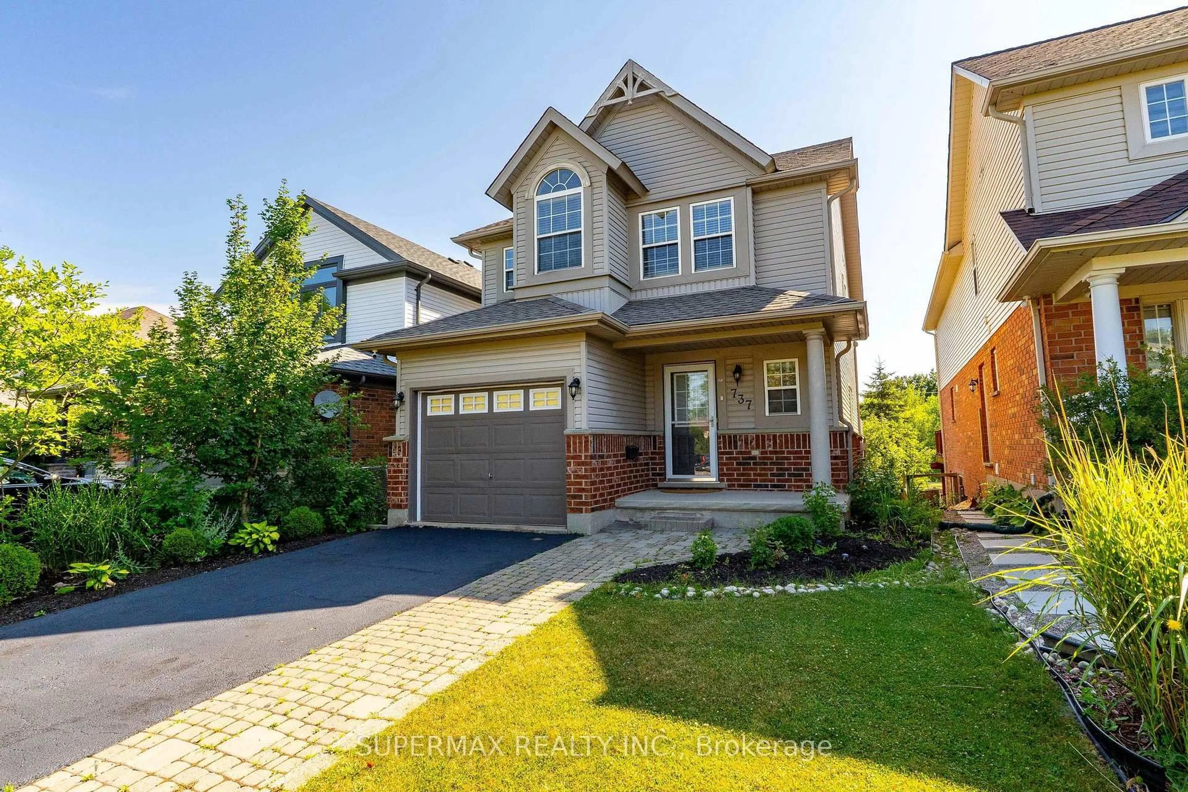 Home with brick exterior material, street for 737 Grand Banks Dr, Waterloo Ontario N2K 4N2