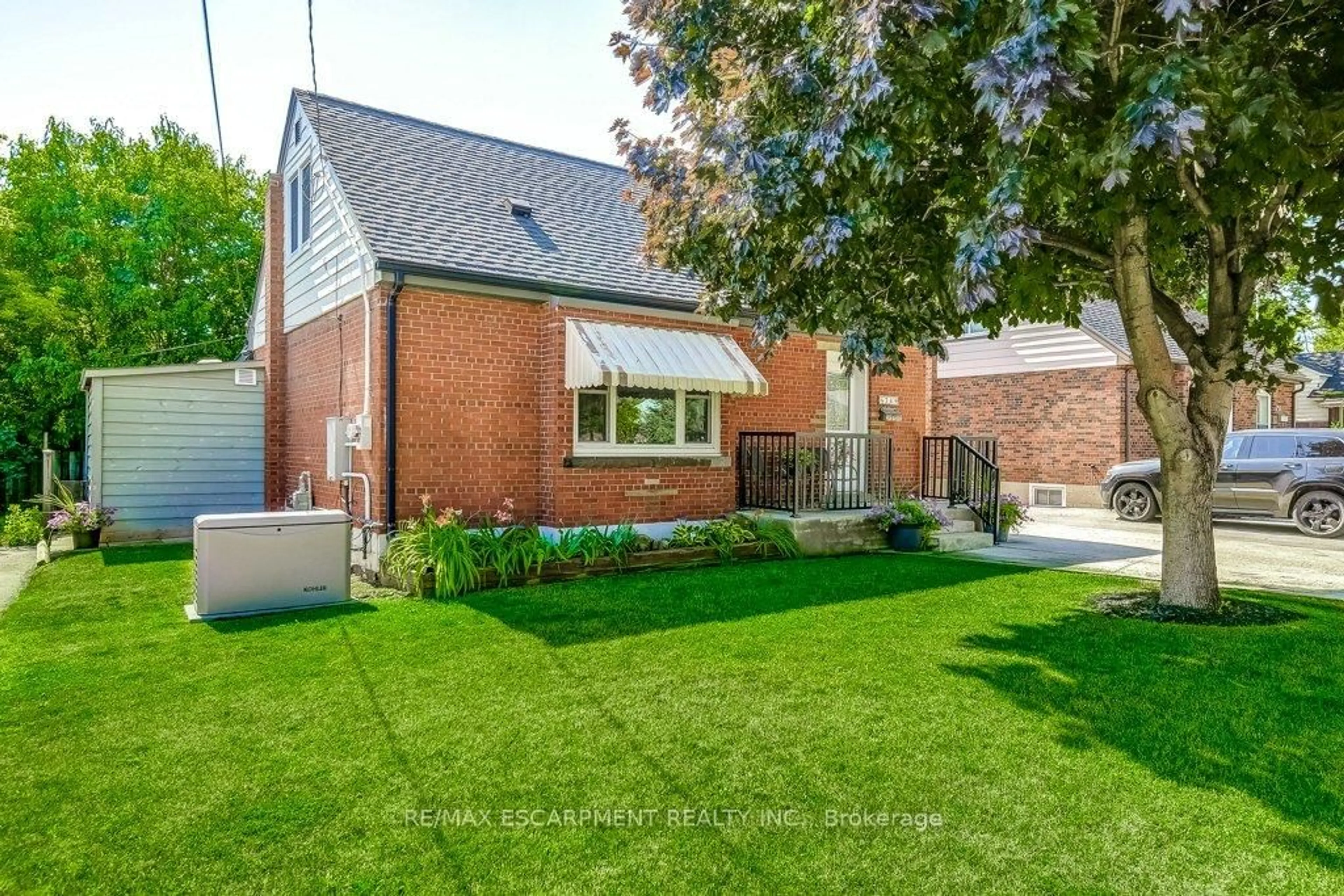 Home with brick exterior material, street for 749 Upper Gage Ave, Hamilton Ontario L8V 4J9