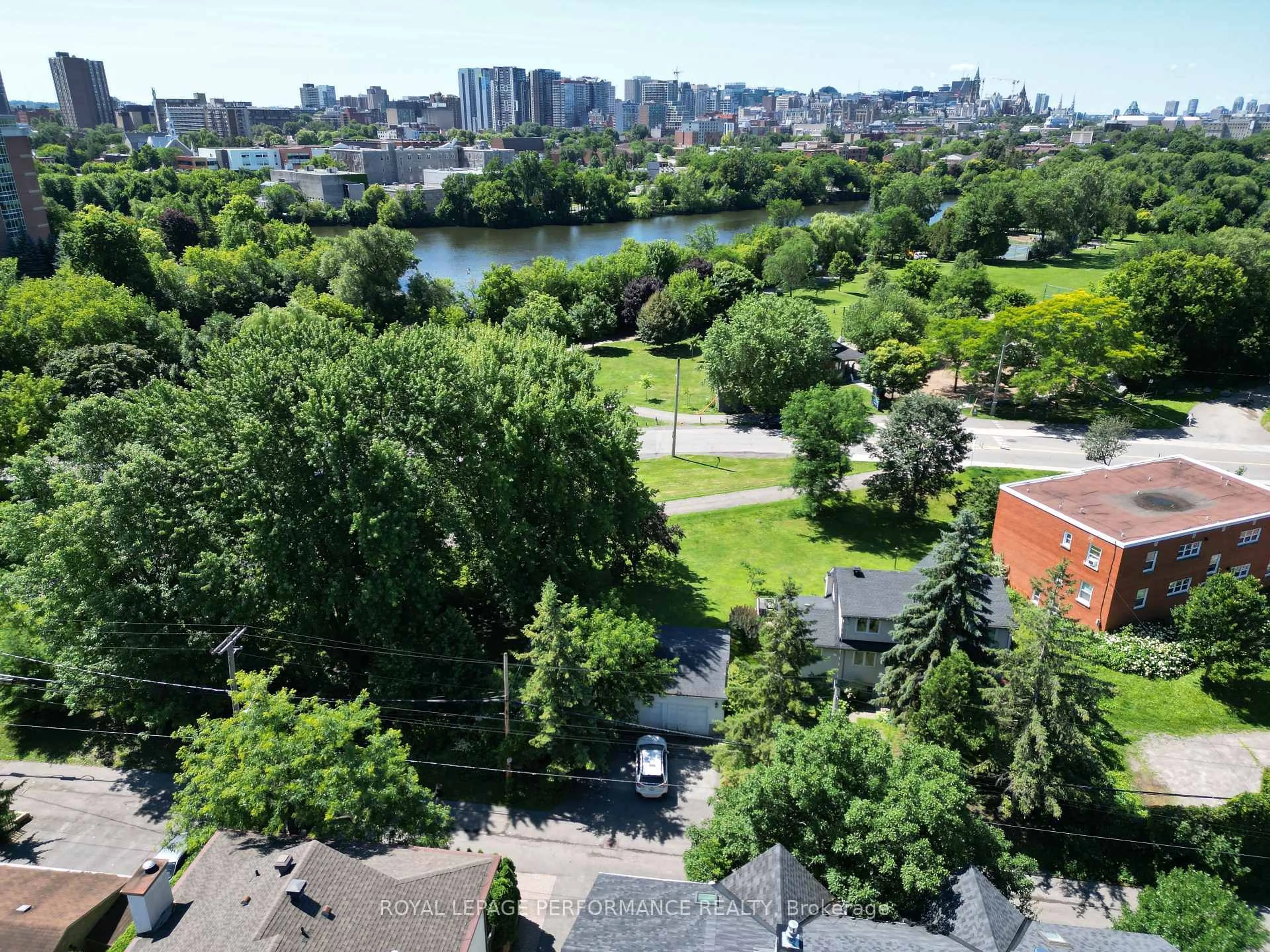 A pic from outside/outdoor area/front of a property/back of a property/a pic from drone, city buildings view from balcony for 177 Crichton St, Ottawa Ontario K1M 1W1