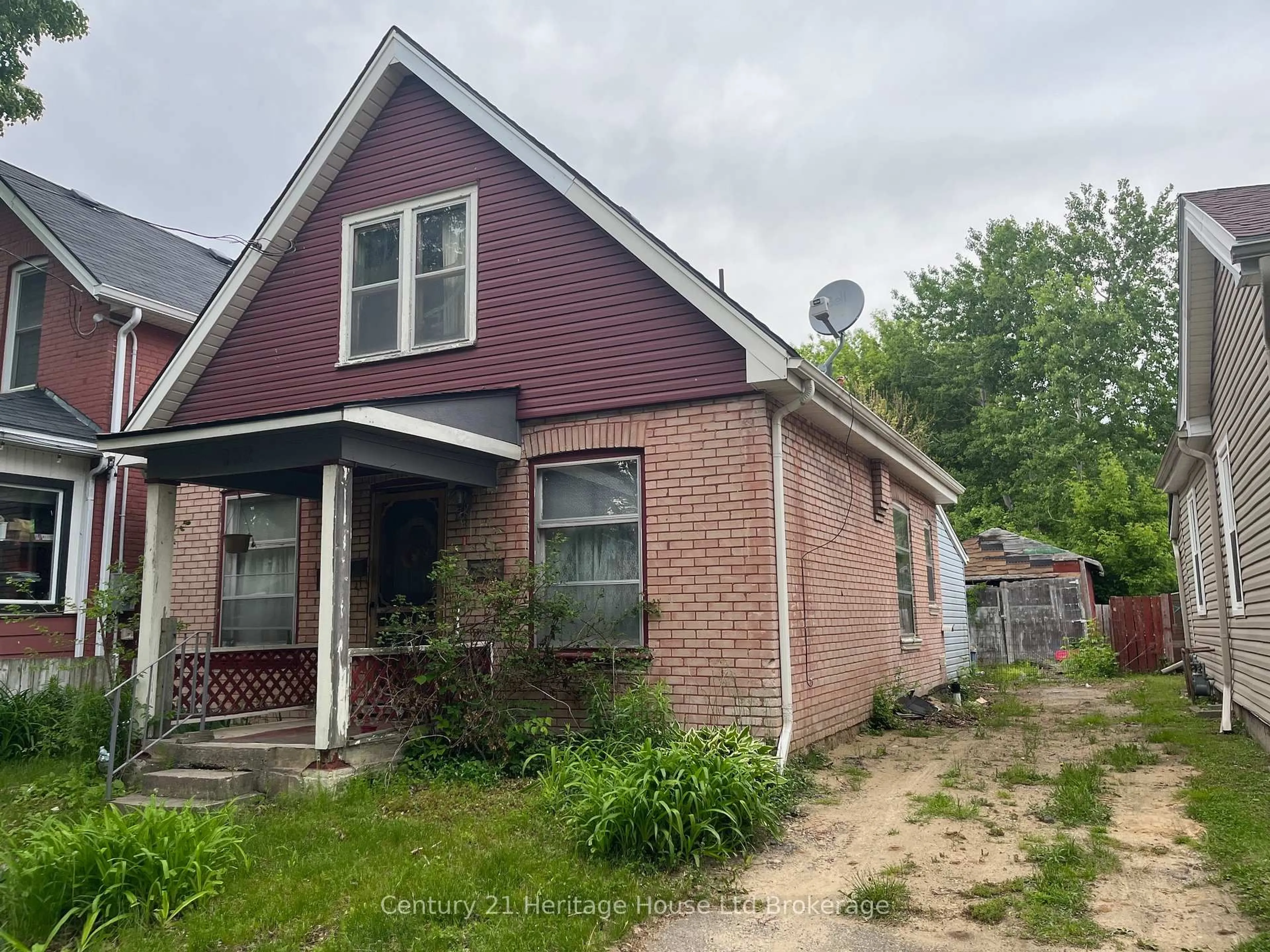 Home with brick exterior material, street for 232 Grey St, Brantford Ontario N3S 4W7