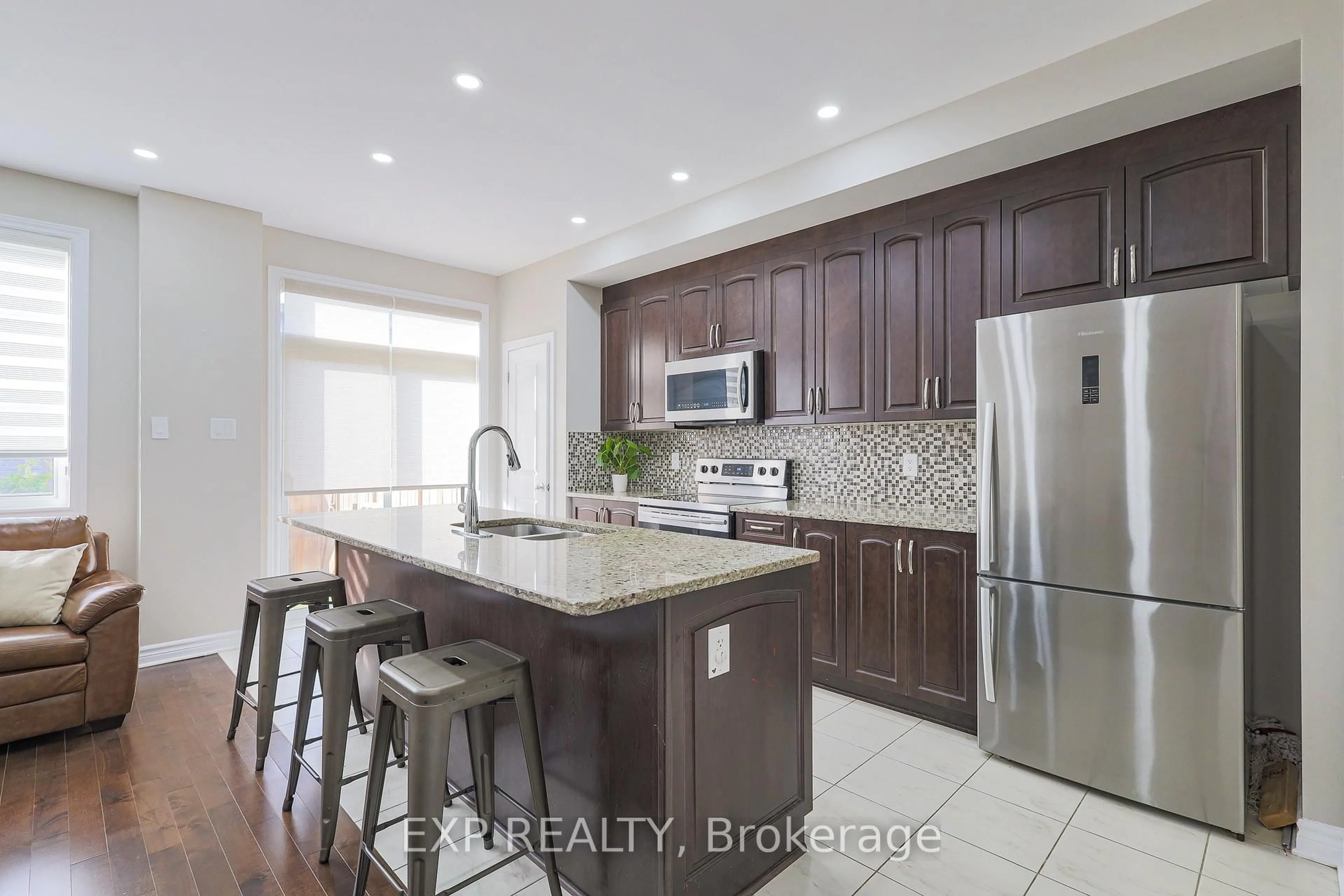 Open concept kitchen, ceramic/tile floor for 119 Ramsgrange St, Ottawa Ontario K2J 6G4
