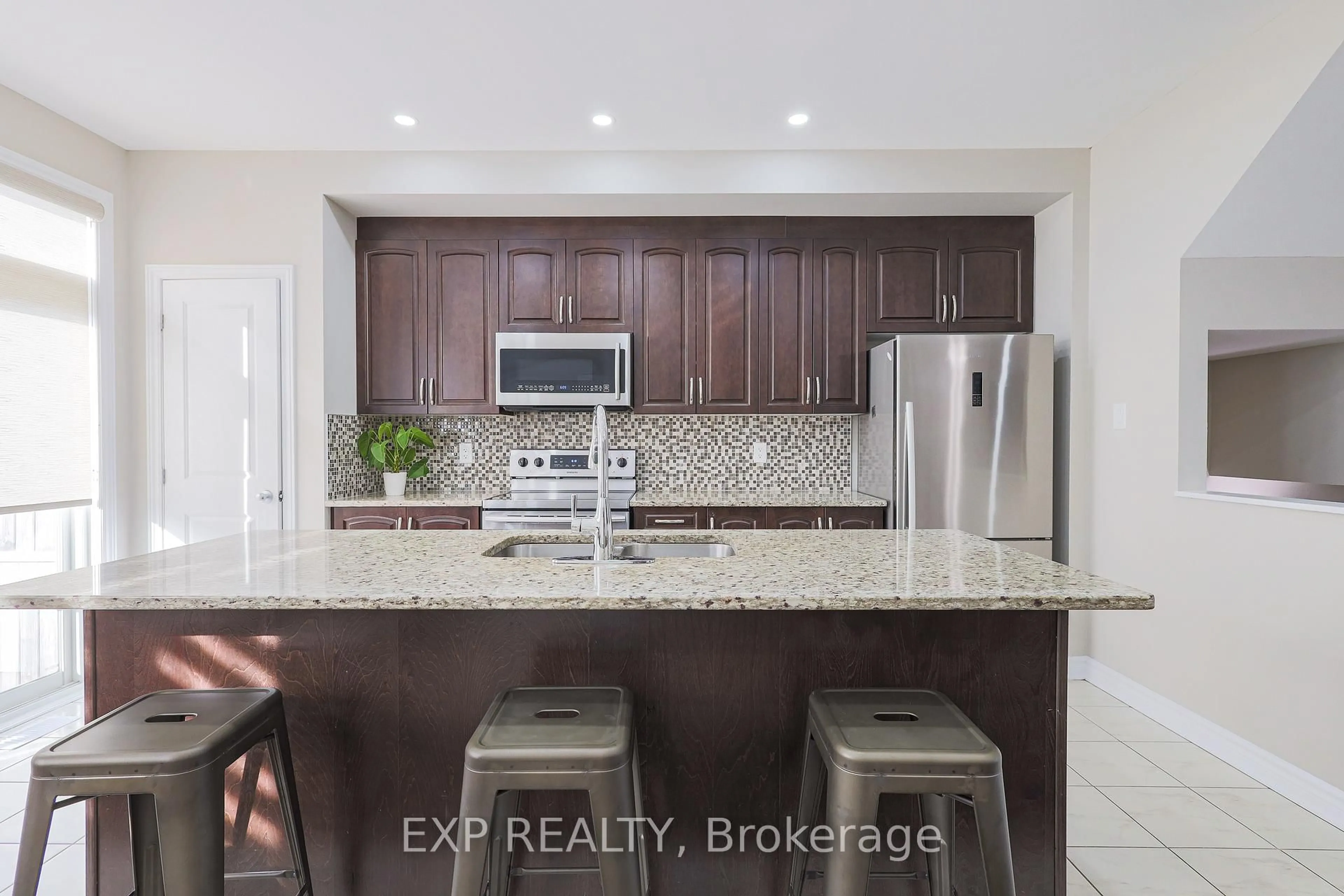 Open concept kitchen, ceramic/tile floor for 119 Ramsgrange St, Ottawa Ontario K2J 6G4