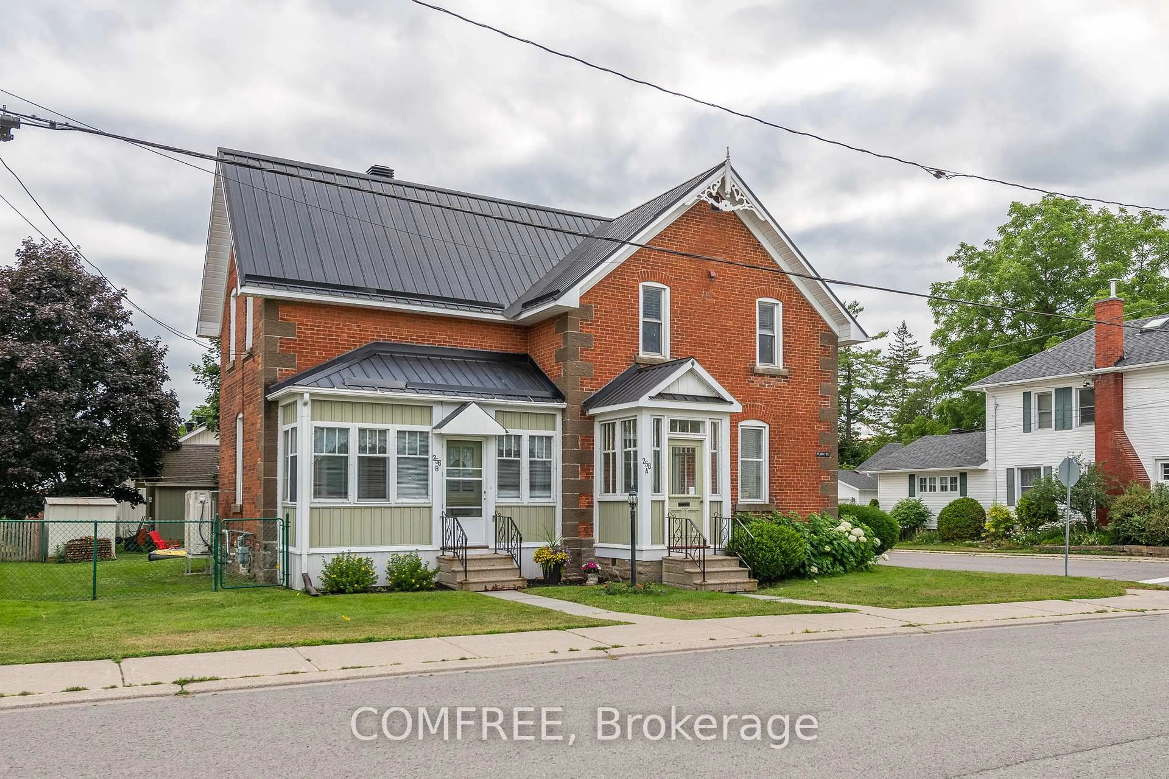 Home with brick exterior material, street for 256A and 256B Flora St, Carleton Place Ontario K7C 3M4