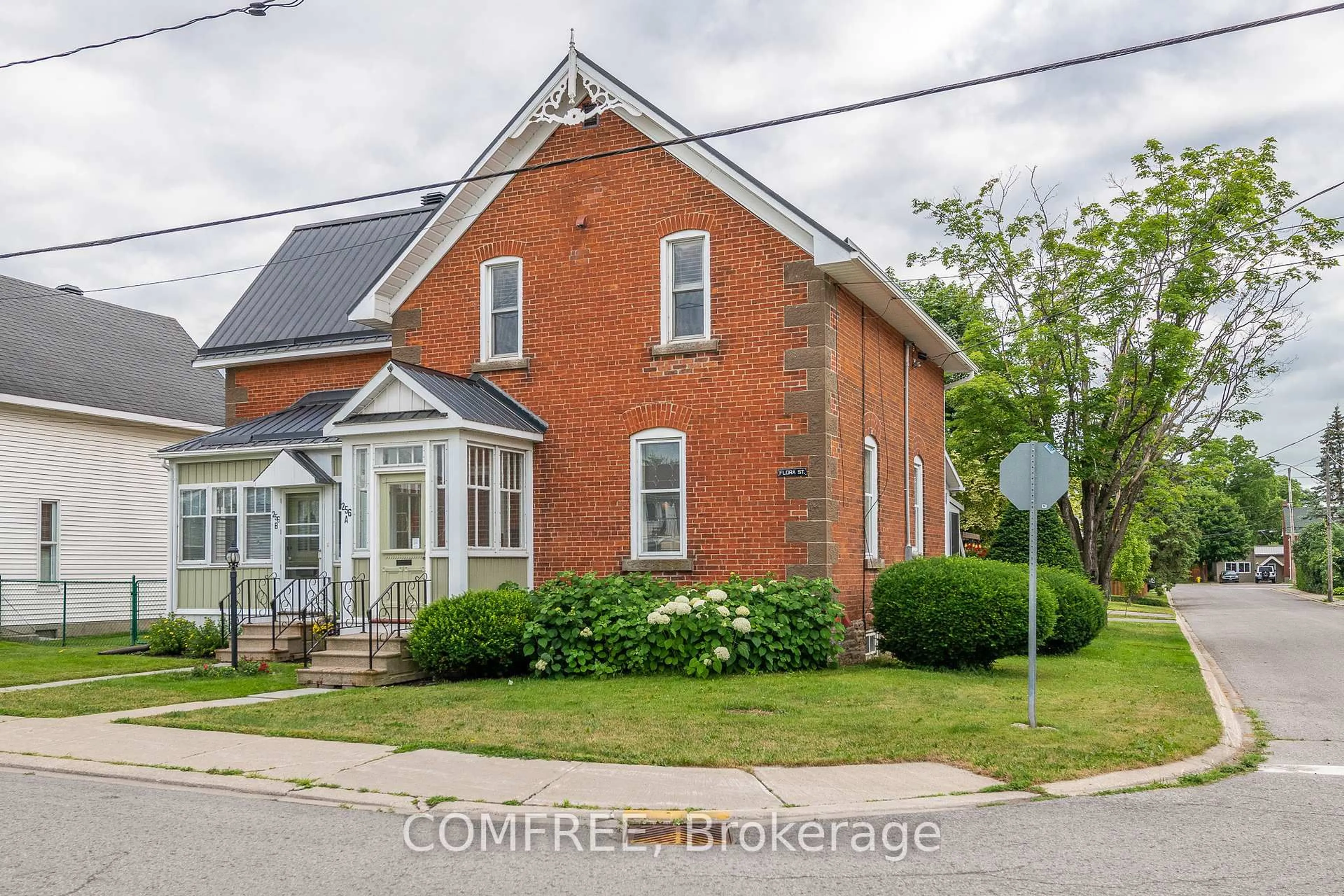 Home with brick exterior material, street for 256A and 256B Flora St, Carleton Place Ontario K7C 3M4