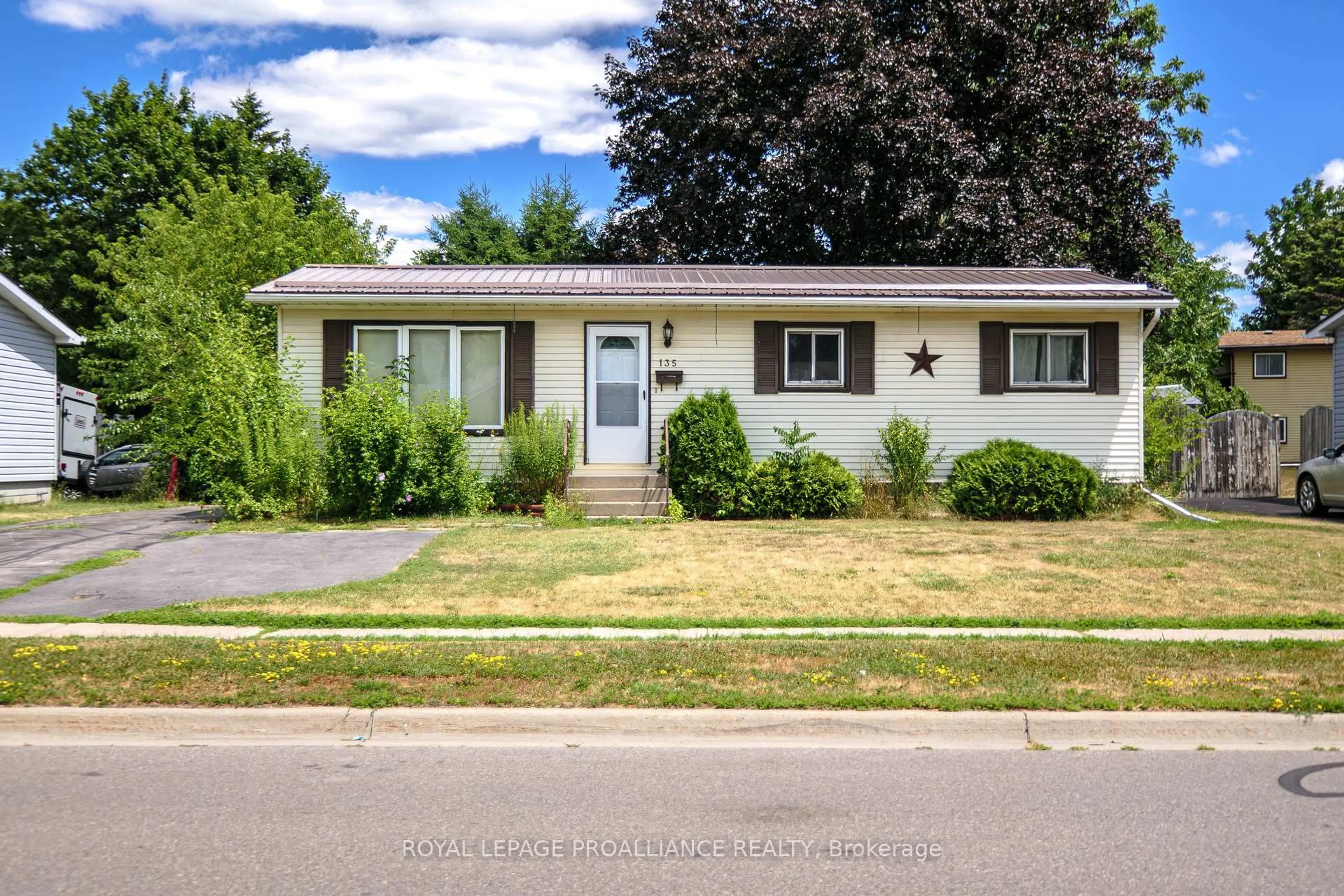 Home with vinyl exterior material, street for 135 Reid St, Quinte West Ontario K8V 5W2