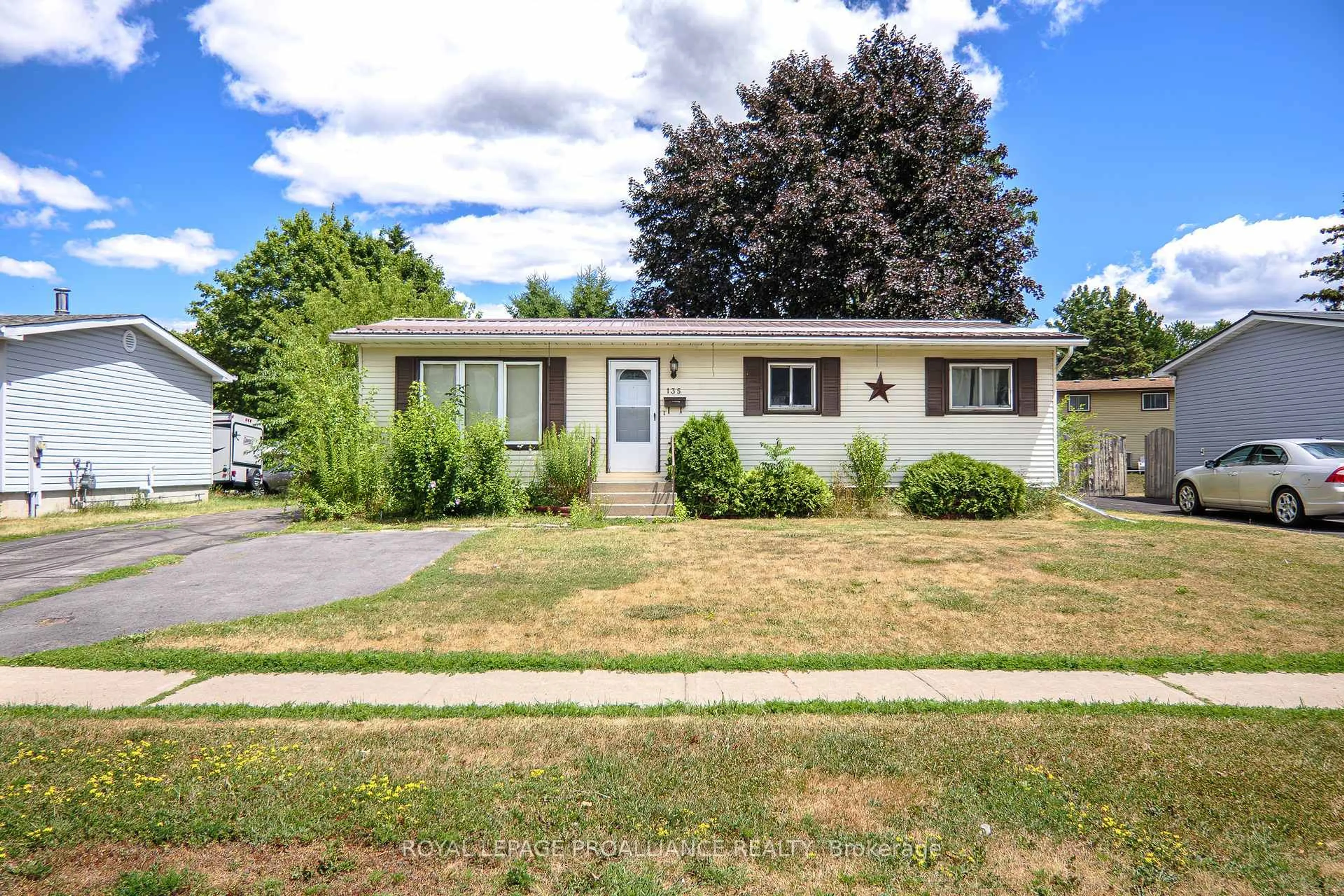 Home with vinyl exterior material, street for 135 Reid St, Quinte West Ontario K8V 5W2