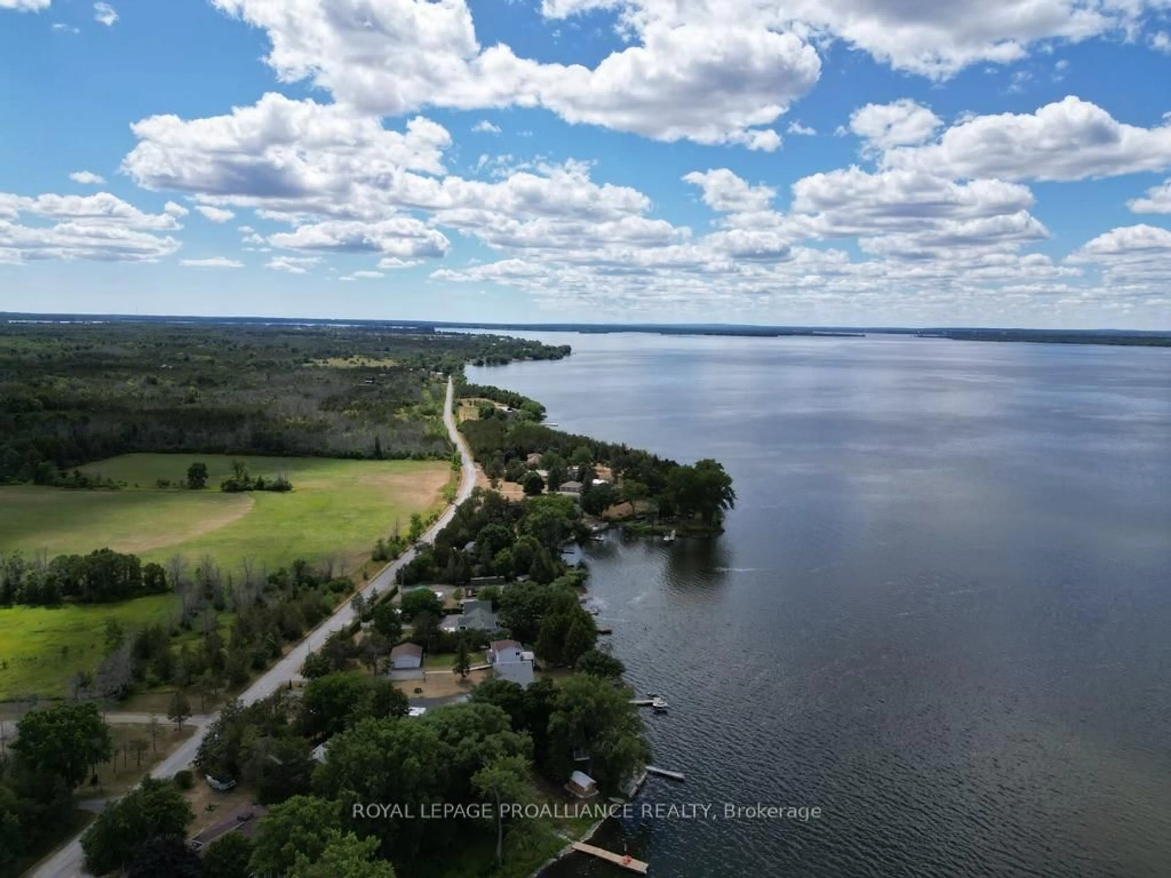 A pic from outside/outdoor area/front of a property/back of a property/a pic from drone, water/lake/river/ocean view for 1692 North Big Island Rd, Prince Edward County Ontario K0K 1W0