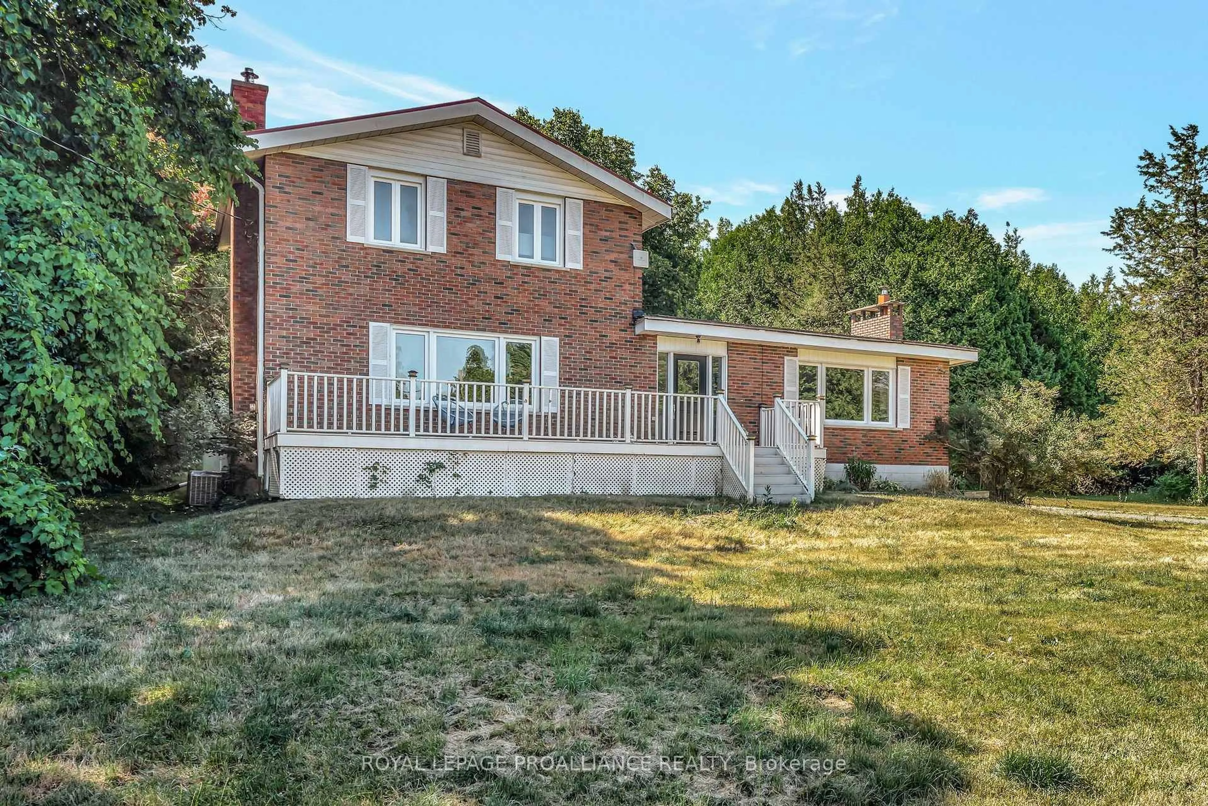 A pic from outside/outdoor area/front of a property/back of a property/a pic from drone, street for 1692 North Big Island Rd, Prince Edward County Ontario K0K 1W0