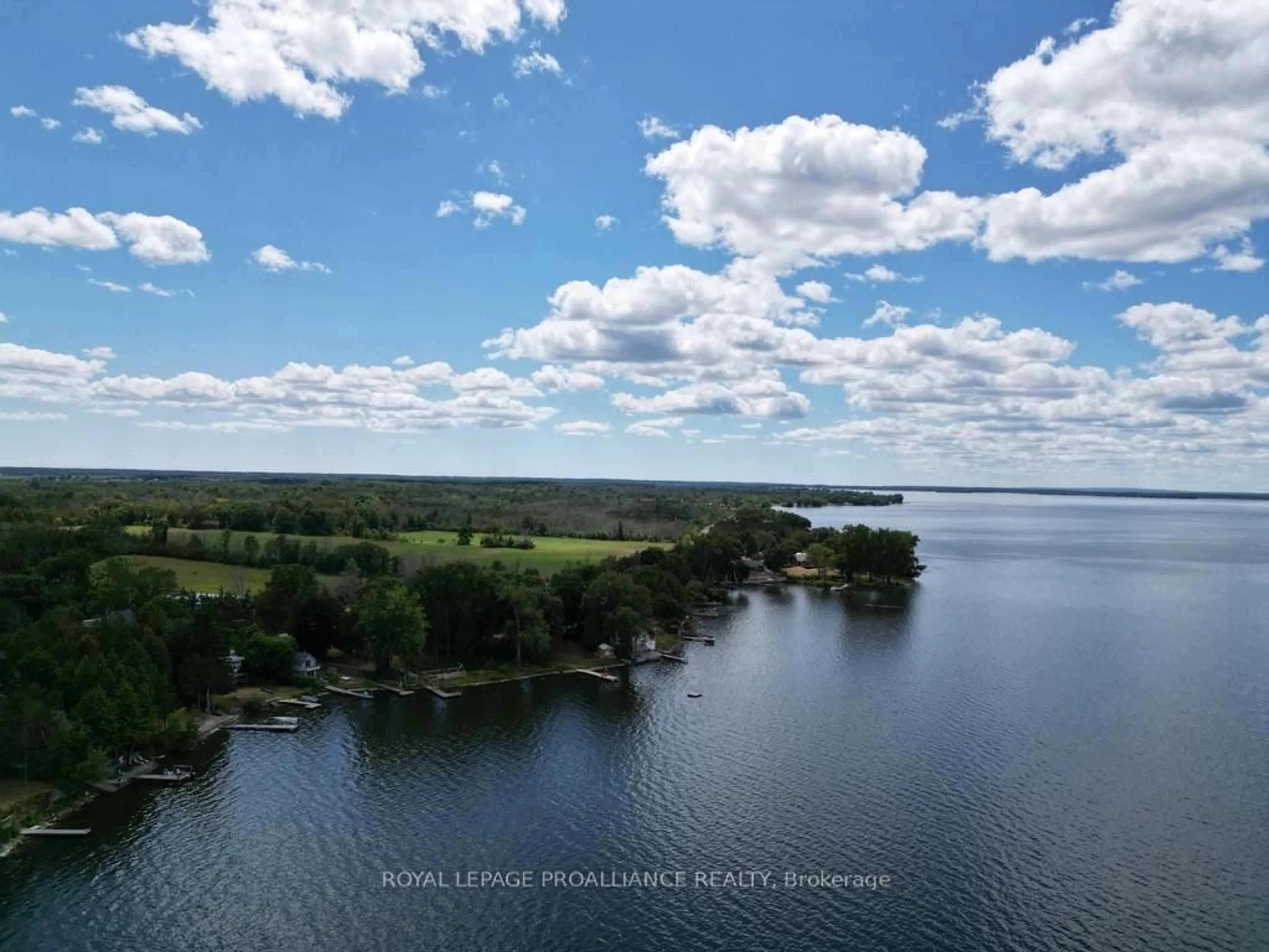 A pic from outside/outdoor area/front of a property/back of a property/a pic from drone, water/lake/river/ocean view for 1692 North Big Island Rd, Prince Edward County Ontario K0K 1W0