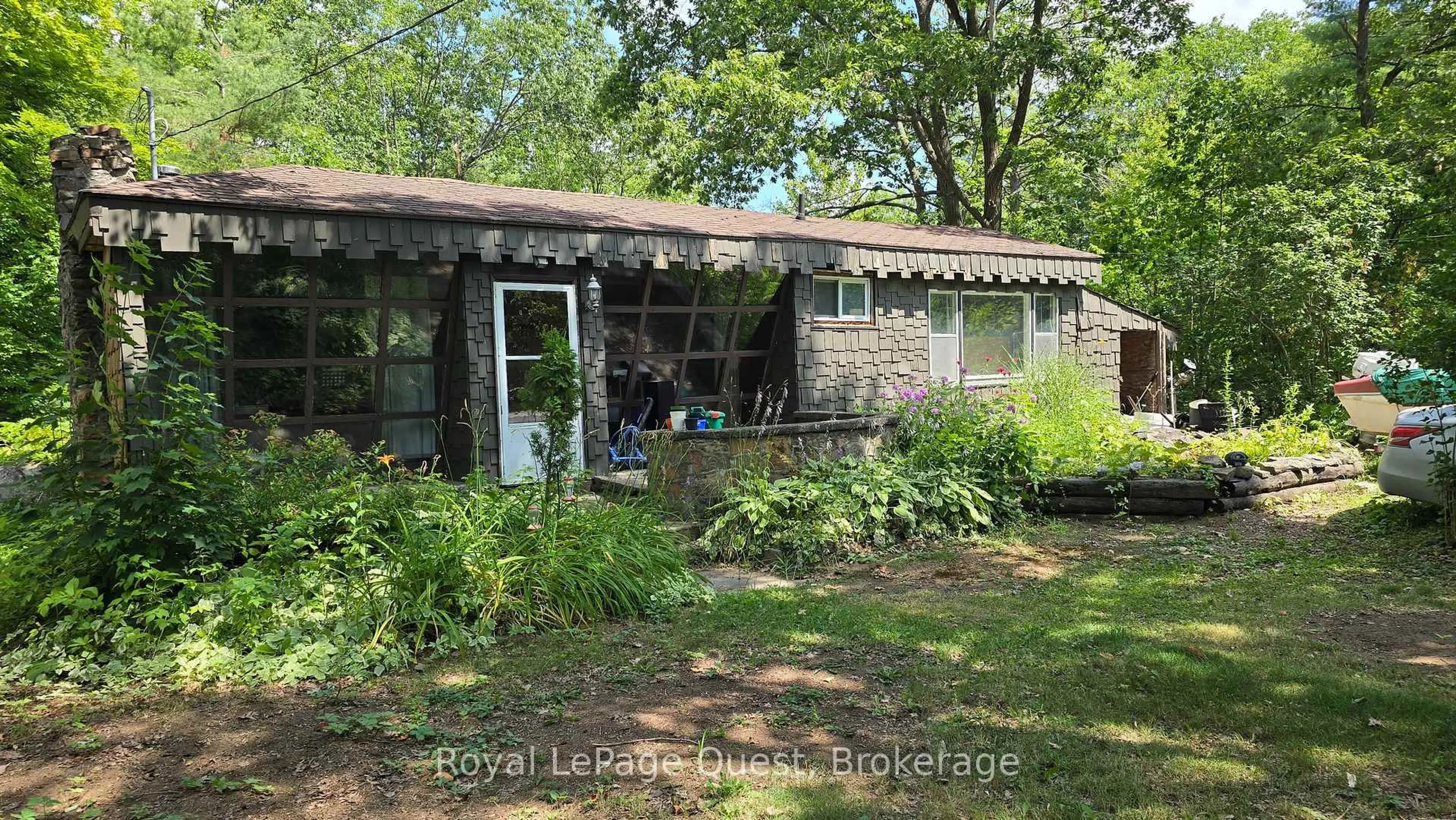 A pic from outside/outdoor area/front of a property/back of a property/a pic from drone, unknown for 1025 North Kahshe Lake Rd, Gravenhurst Ontario P0E 1G0