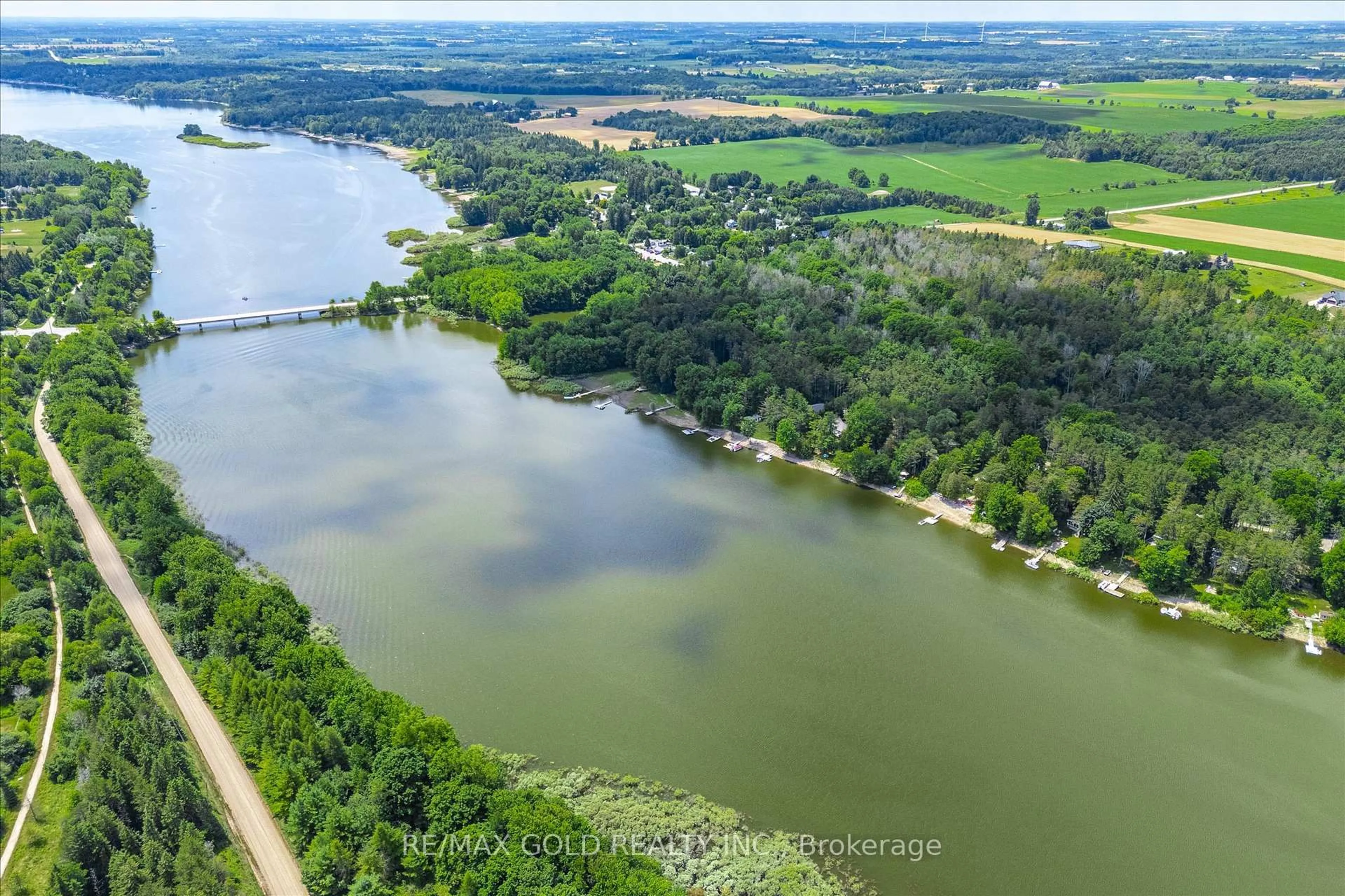 A pic from outside/outdoor area/front of a property/back of a property/a pic from drone, water/lake/river/ocean view for 1015 Tenth St, Centre Wellington Ontario N0B 1J0