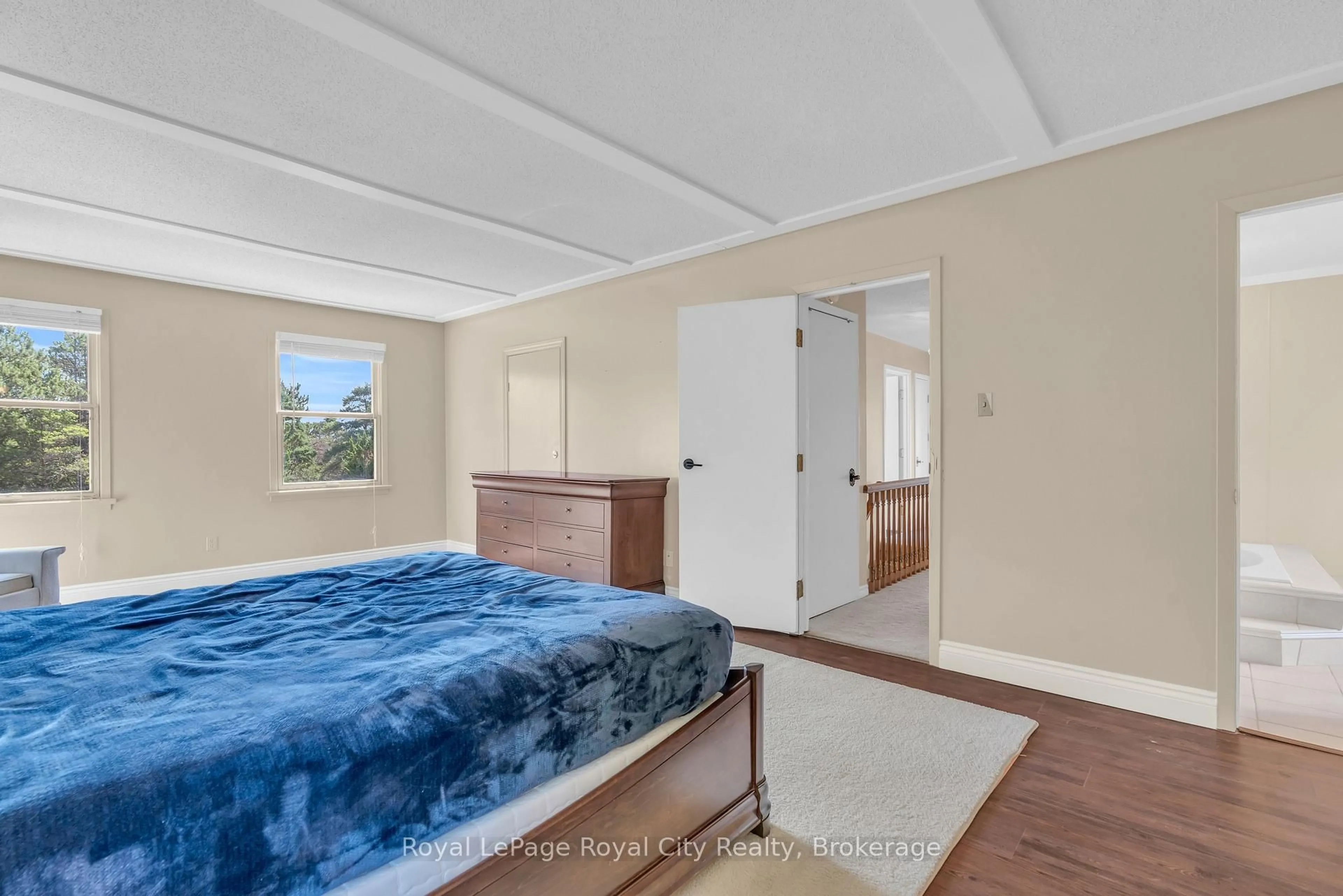 Bedroom with bed, wood/laminate floor for 4502 Wellington Road 35 Rd, Puslinch Ontario N1H 6J3