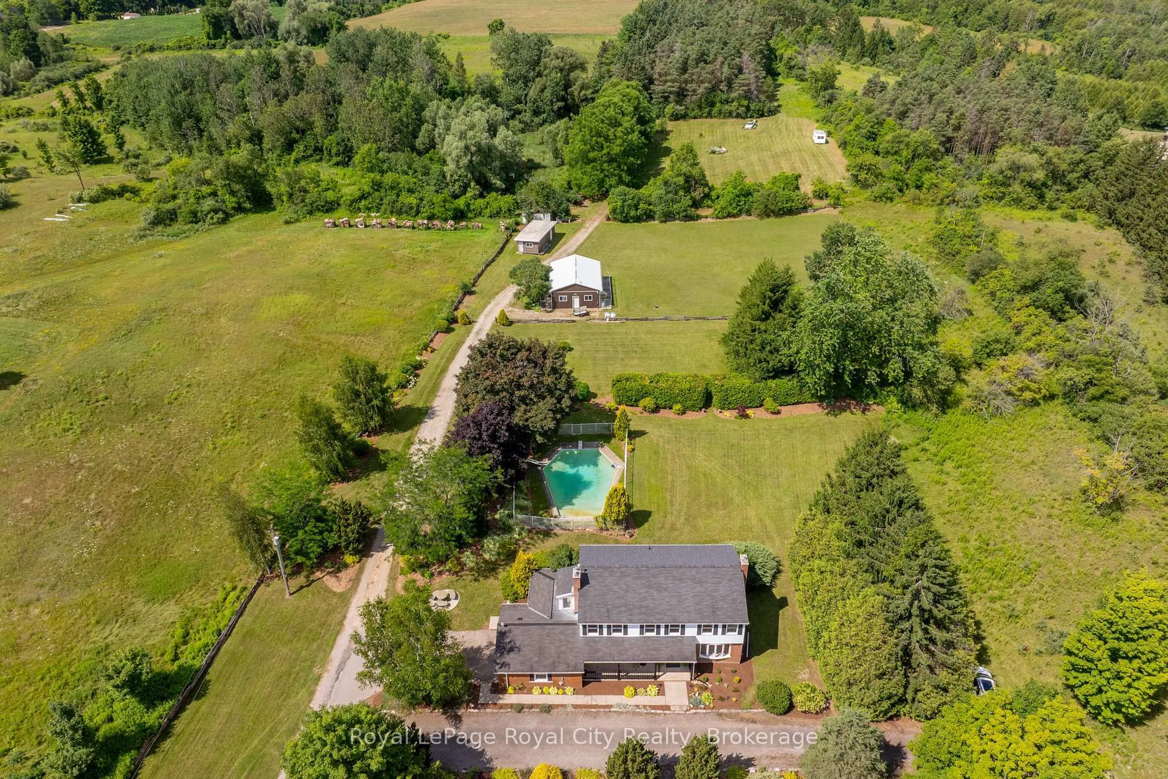 A pic from outside/outdoor area/front of a property/back of a property/a pic from drone, unknown for 4502 Wellington Road 35 Rd, Puslinch Ontario N1H 6J3