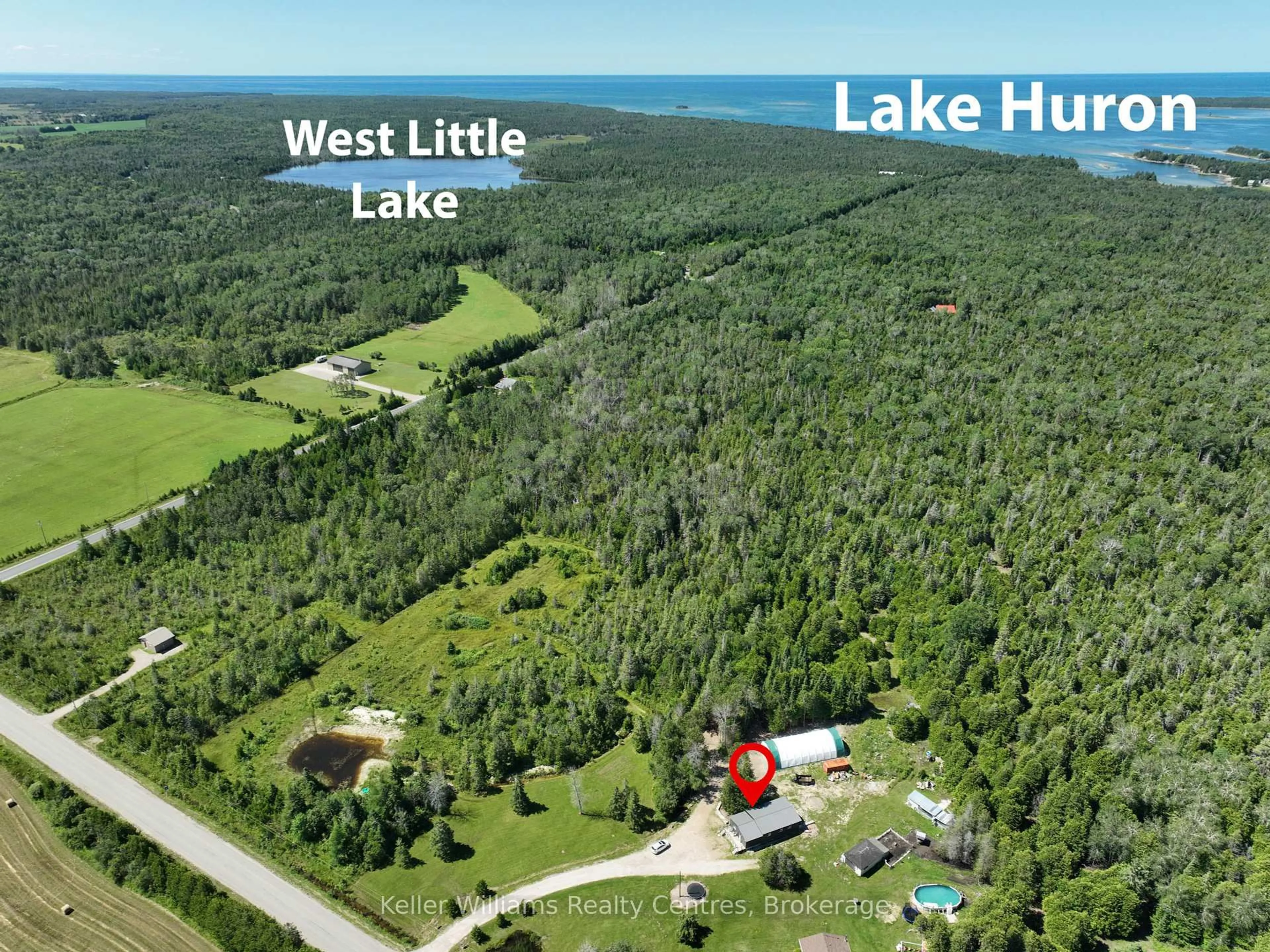 A pic from outside/outdoor area/front of a property/back of a property/a pic from drone, water/lake/river/ocean view for 23 Stokes Bay Rd, Northern Bruce Peninsula Ontario N0H 1W0
