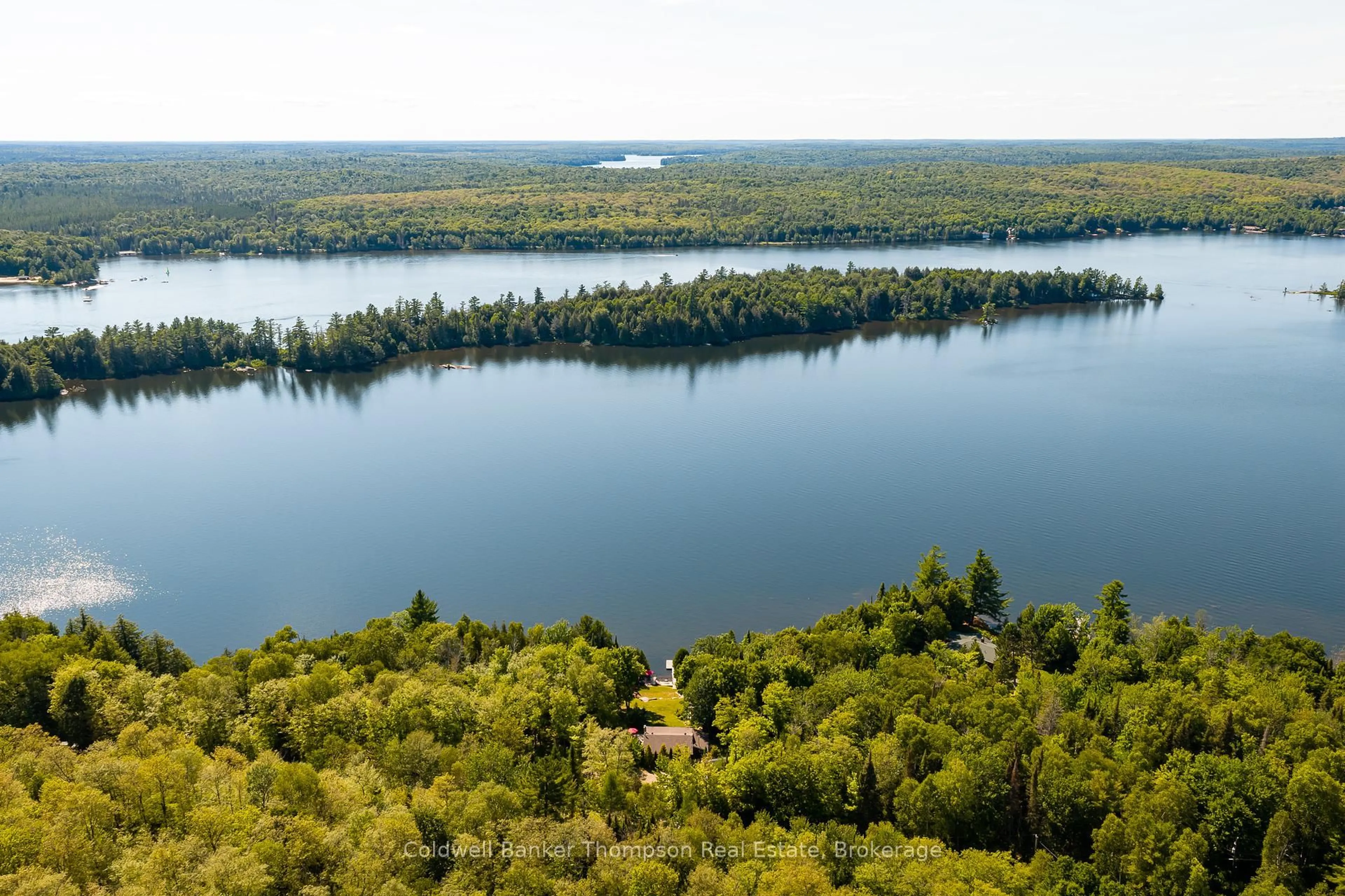 A pic from outside/outdoor area/front of a property/back of a property/a pic from drone, water/lake/river/ocean view for 190 Morris Lane, Machar Ontario P0A 1X0
