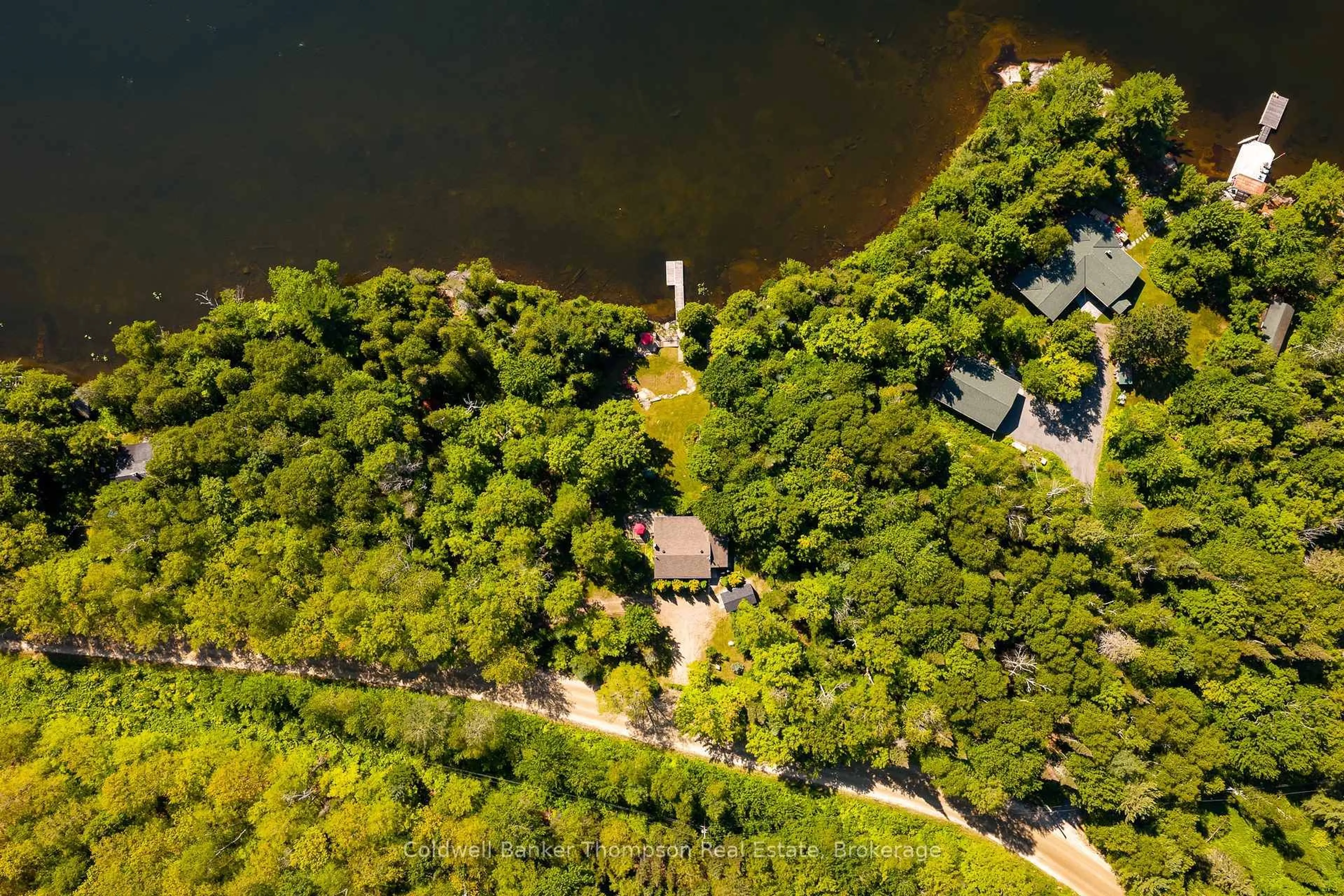 A pic from outside/outdoor area/front of a property/back of a property/a pic from drone, water/lake/river/ocean view for 190 Morris Lane, Machar Ontario P0A 1X0