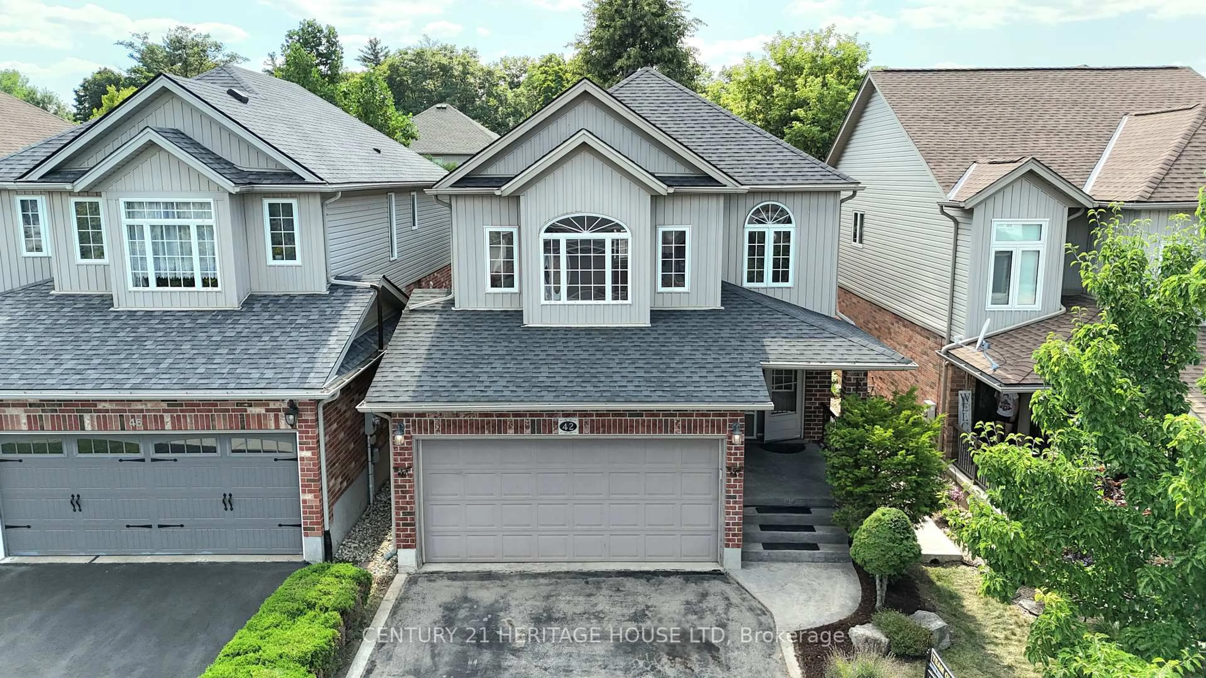A pic from outside/outdoor area/front of a property/back of a property/a pic from drone, street for 42 Bridleridge St, Kitchener Ontario N2P 2V1