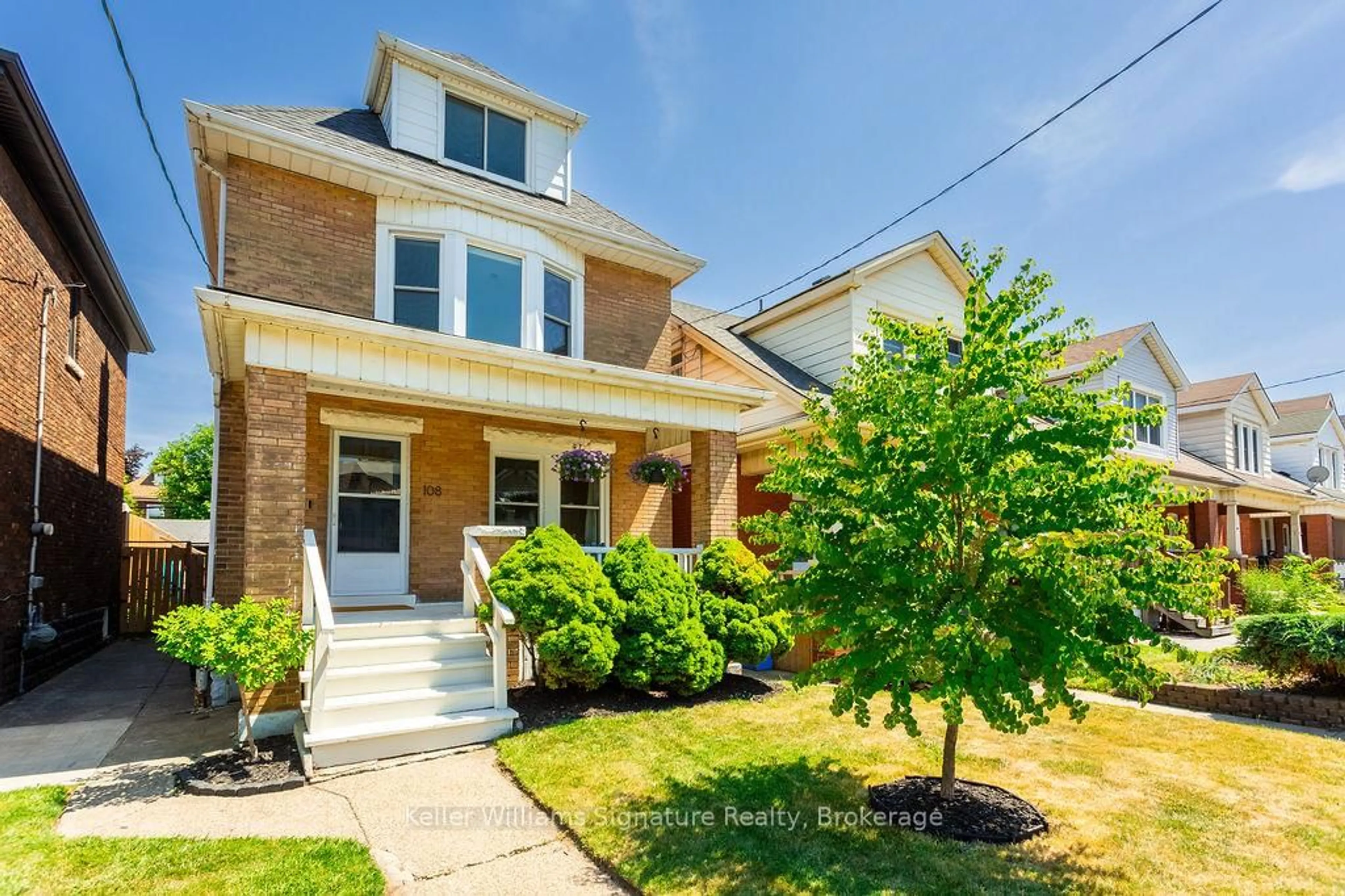 Home with brick exterior material, street for 108 Belmont Ave, Hamilton Ontario L8L 7M1
