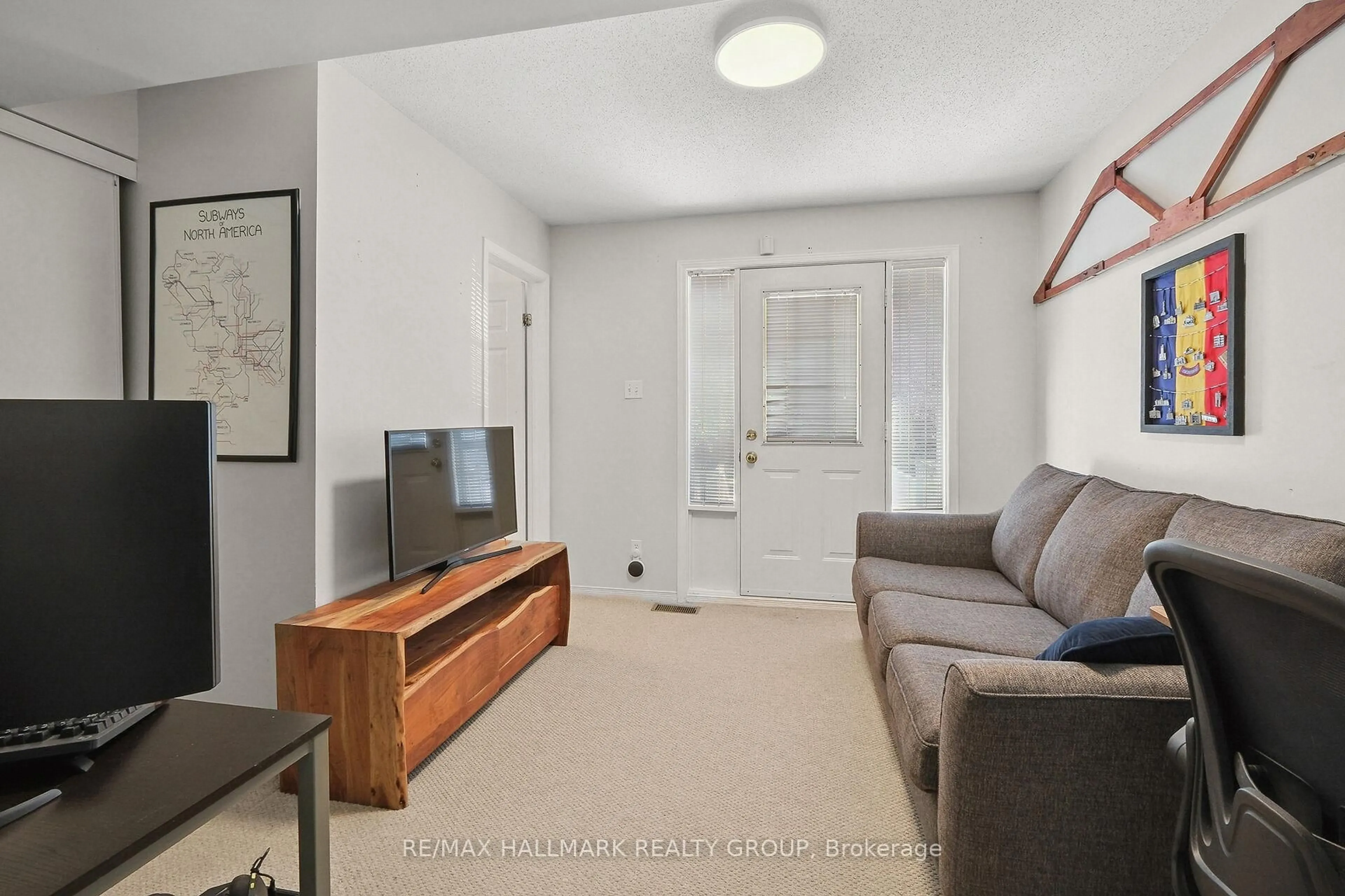 Living room with furniture, unknown for 9 Radstock Private, Ottawa Ontario K1R 5J8