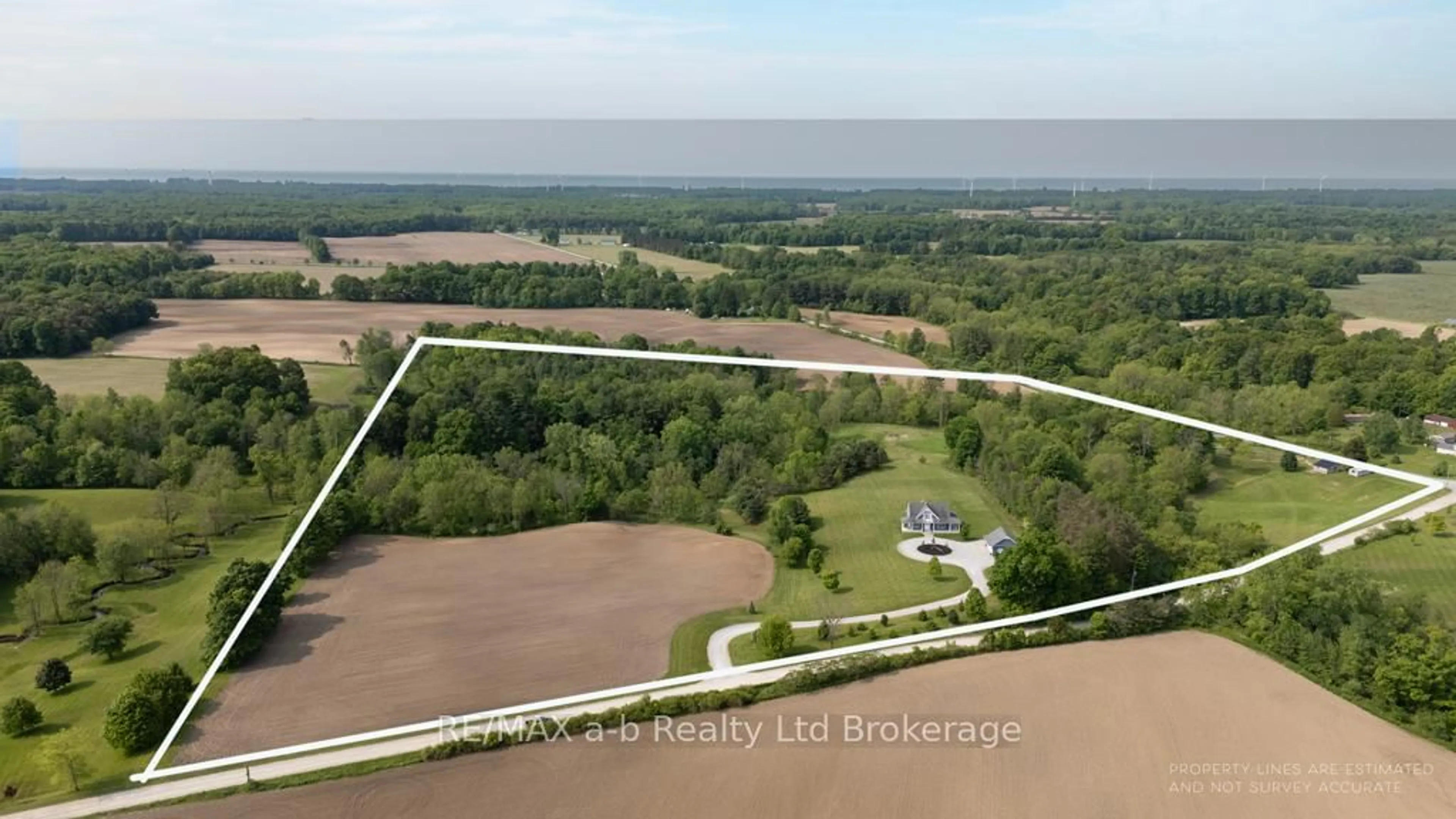 A pic from outside/outdoor area/front of a property/back of a property/a pic from drone, water/lake/river/ocean view for 210 Beach Lane, Norfolk Ontario N0E 1G0