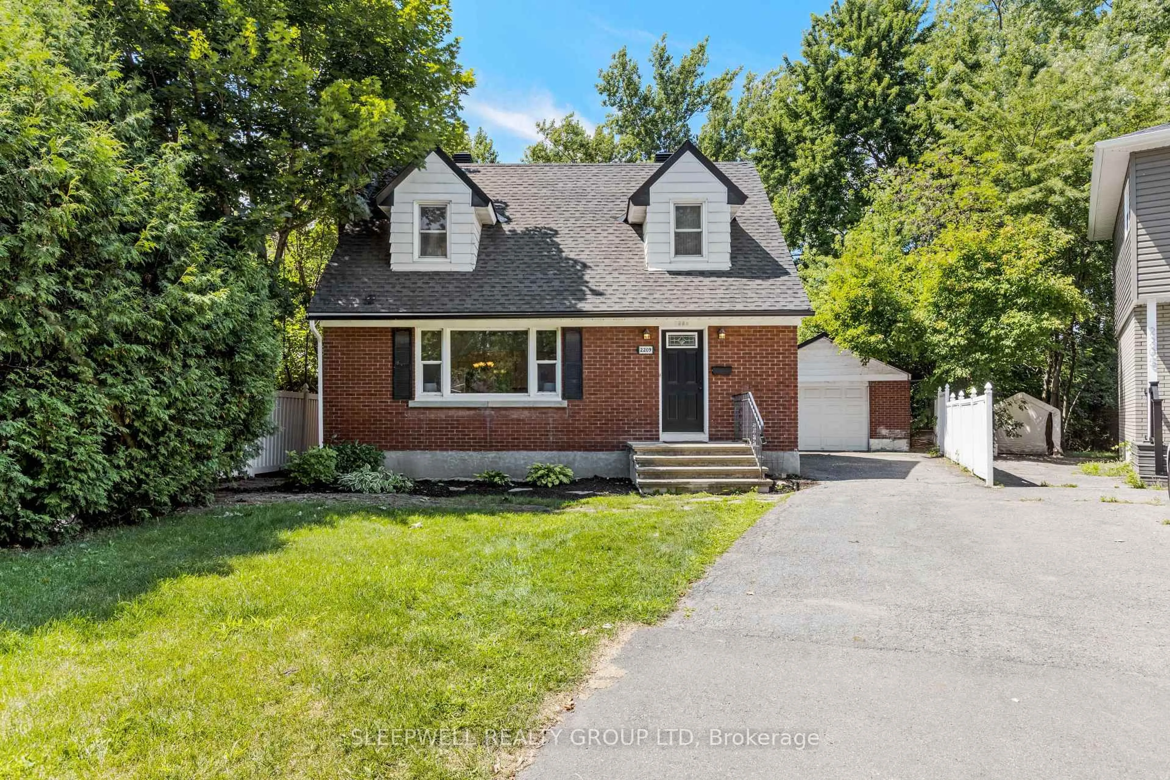 Home with brick exterior material, street for 2209 Belair Dr, Ottawa Ontario K2C 0X2