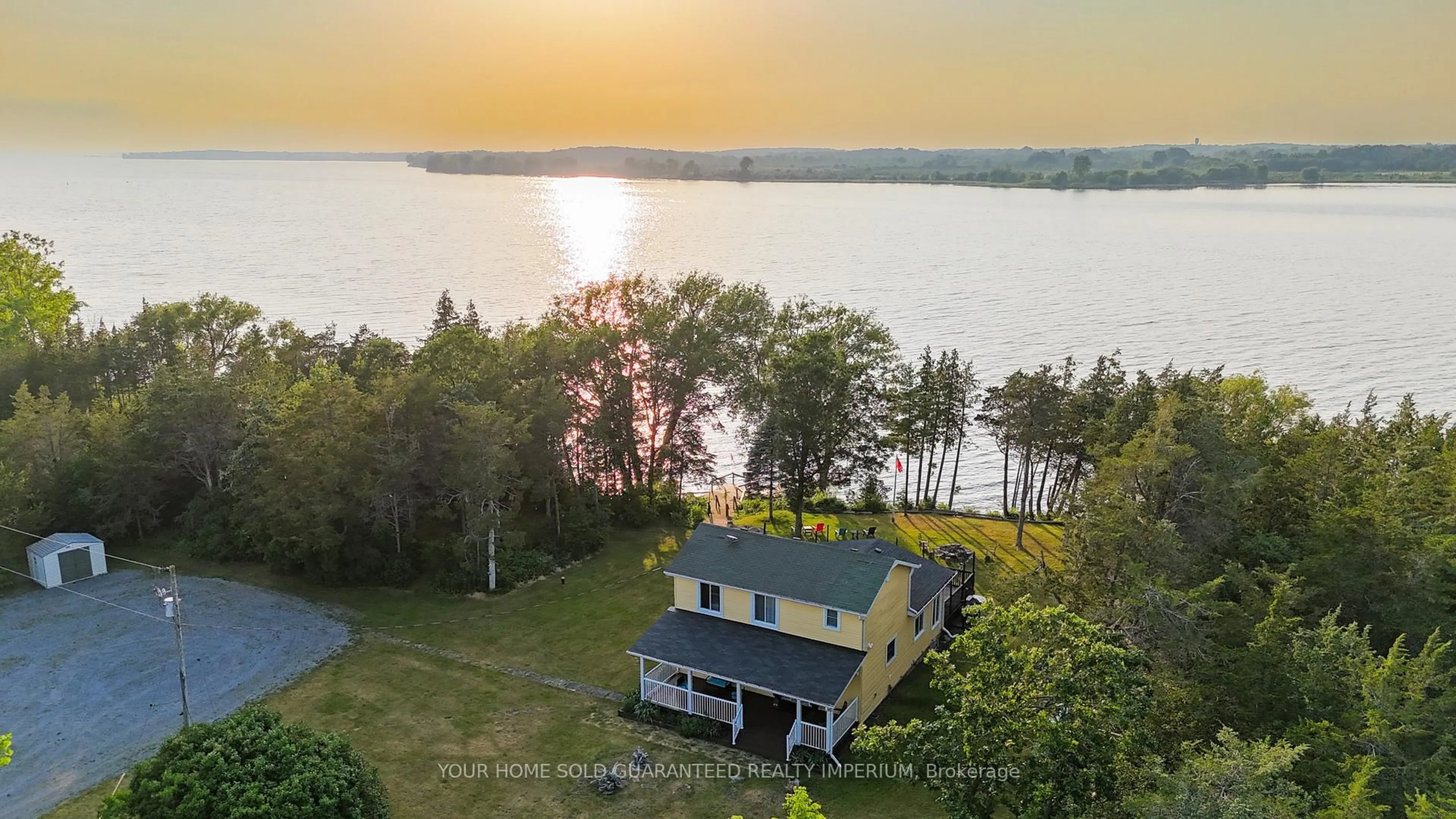 A pic from outside/outdoor area/front of a property/back of a property/a pic from drone, water/lake/river/ocean view for 2491 COUNTY ROAD 15 Rd, Prince Edward County Ontario K0K 2T0