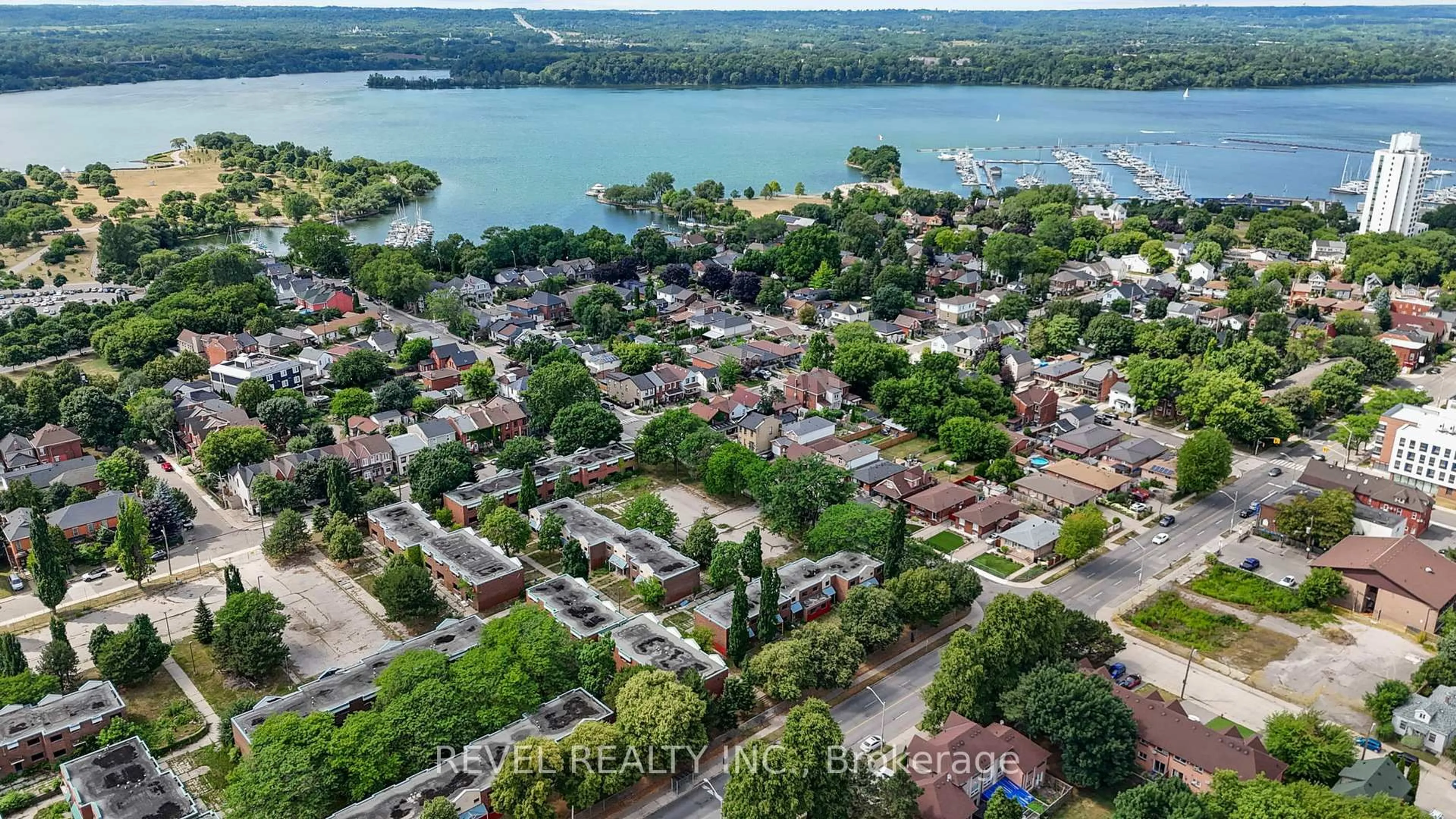 A pic from outside/outdoor area/front of a property/back of a property/a pic from drone, water/lake/river/ocean view for 380 Macnab St, Hamilton Ontario L8L 1L1