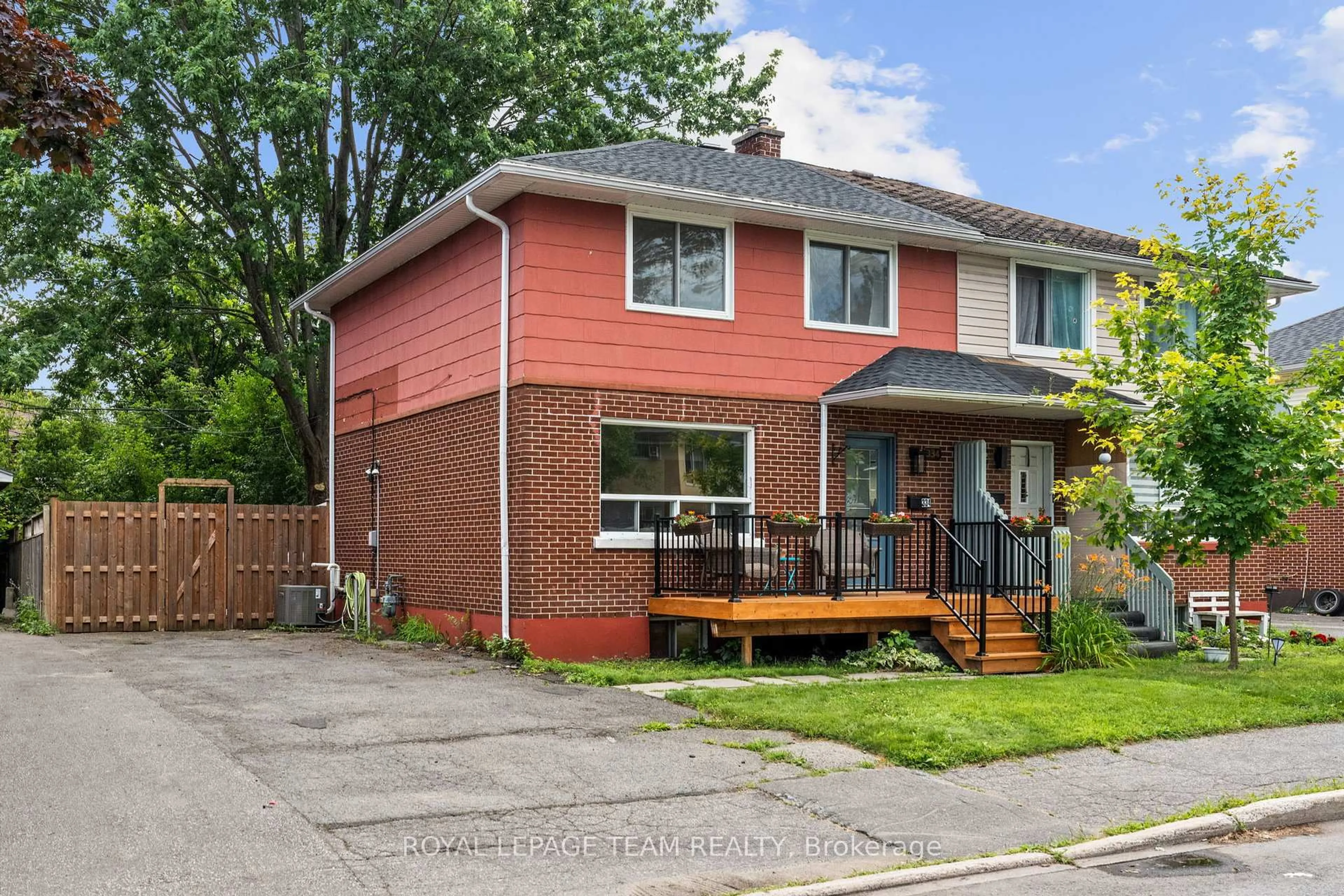 Home with brick exterior material, street for 334 Queen Mary St, Ottawa Ontario K1K 1W9