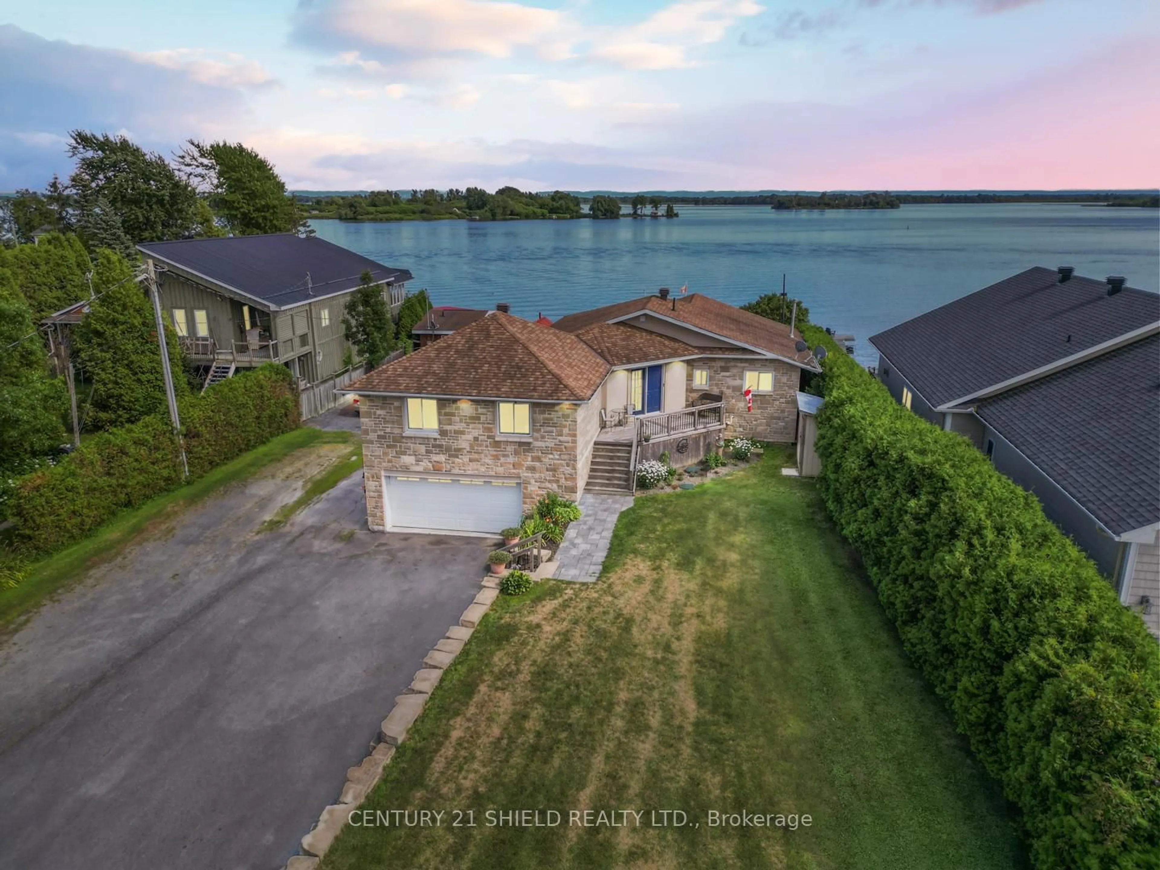 A pic from outside/outdoor area/front of a property/back of a property/a pic from drone, water/lake/river/ocean view for 19018 County Road 2 Rd, South Glengarry Ontario K6H 5R5
