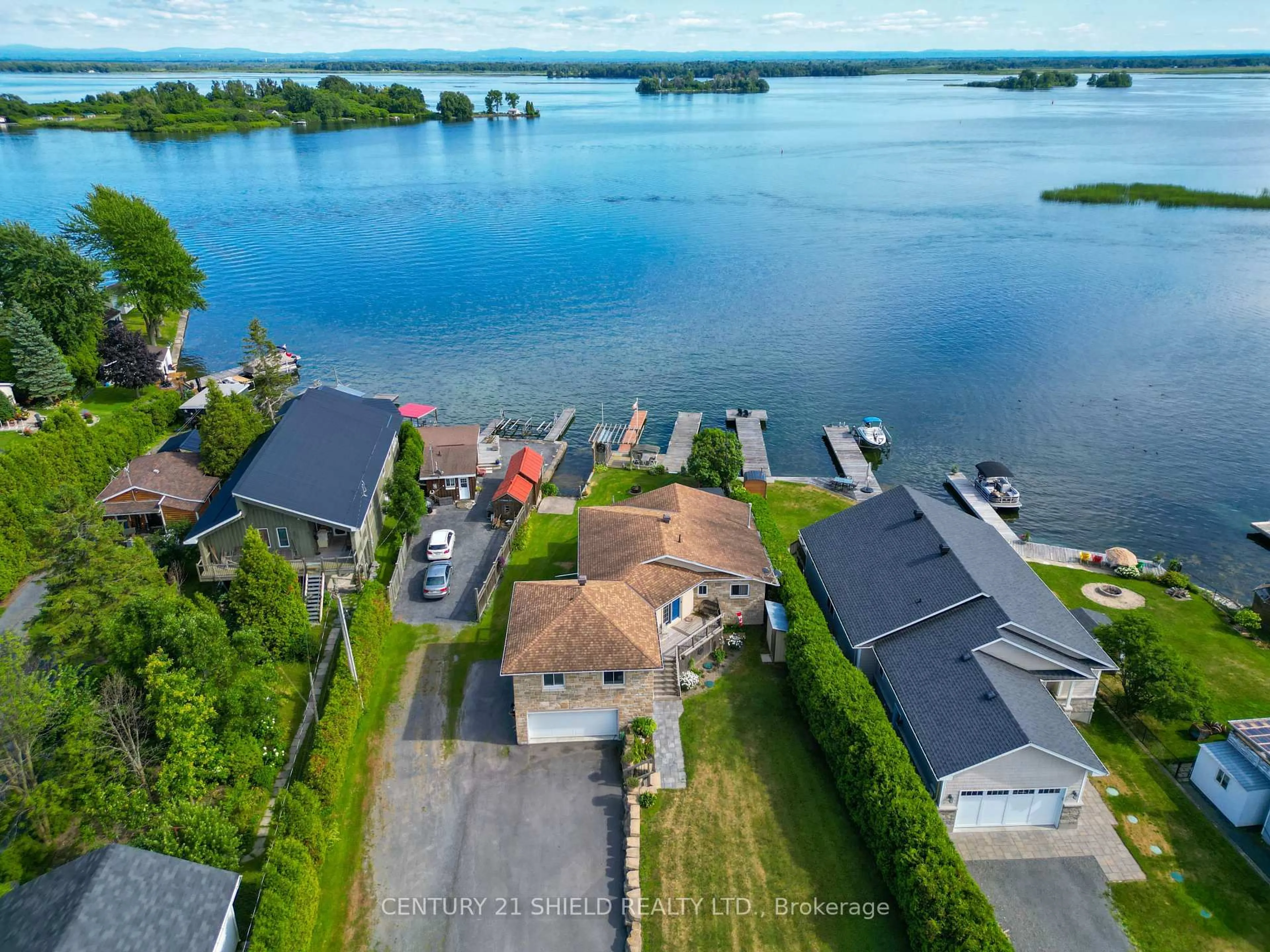A pic from outside/outdoor area/front of a property/back of a property/a pic from drone, water/lake/river/ocean view for 19018 County Road 2 Rd, South Glengarry Ontario K6H 5R5
