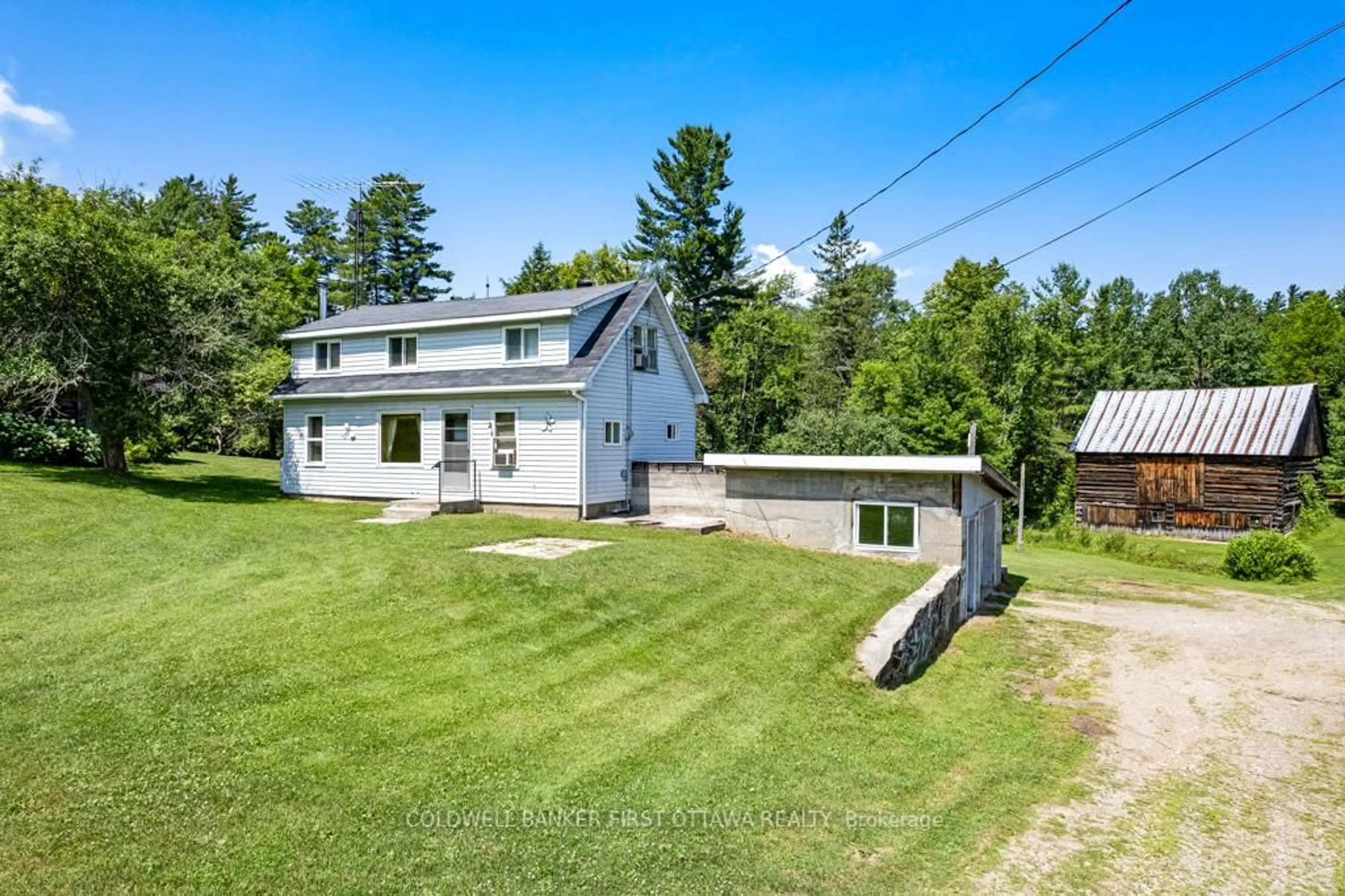 A pic from outside/outdoor area/front of a property/back of a property/a pic from drone, unknown for 9252 Highway 511 Rd, Lanark Ontario K0G 1K0