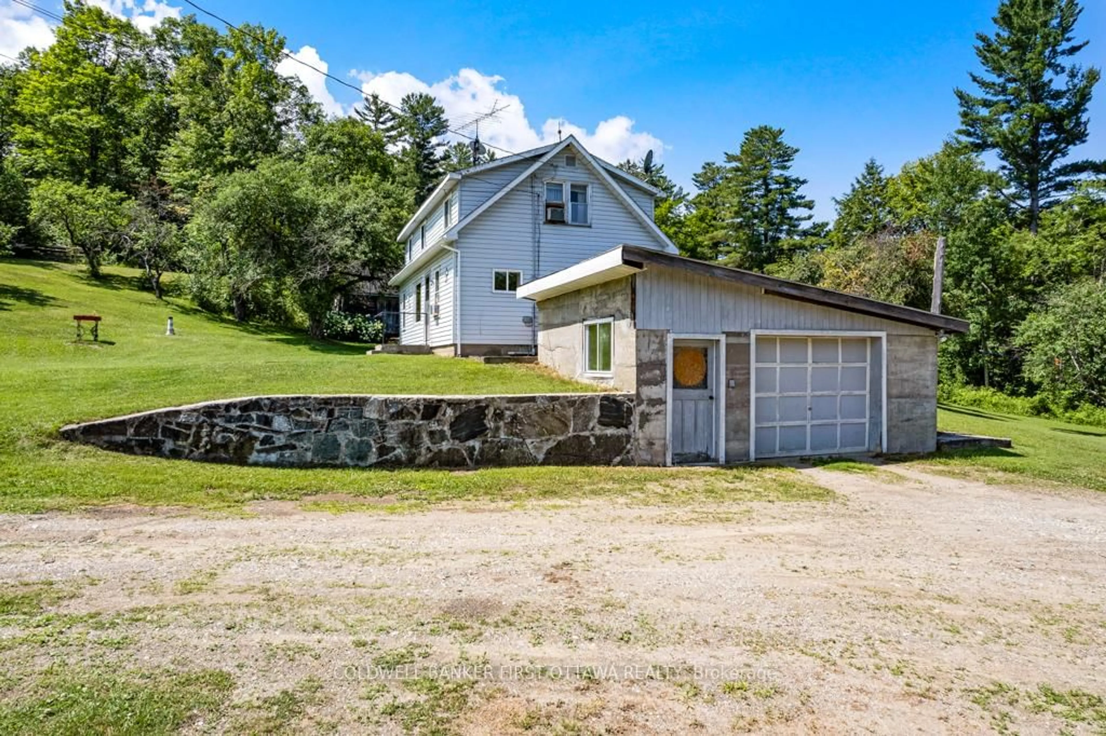 A pic from outside/outdoor area/front of a property/back of a property/a pic from drone, building for 9252 Highway 511 Rd, Lanark Ontario K0G 1K0