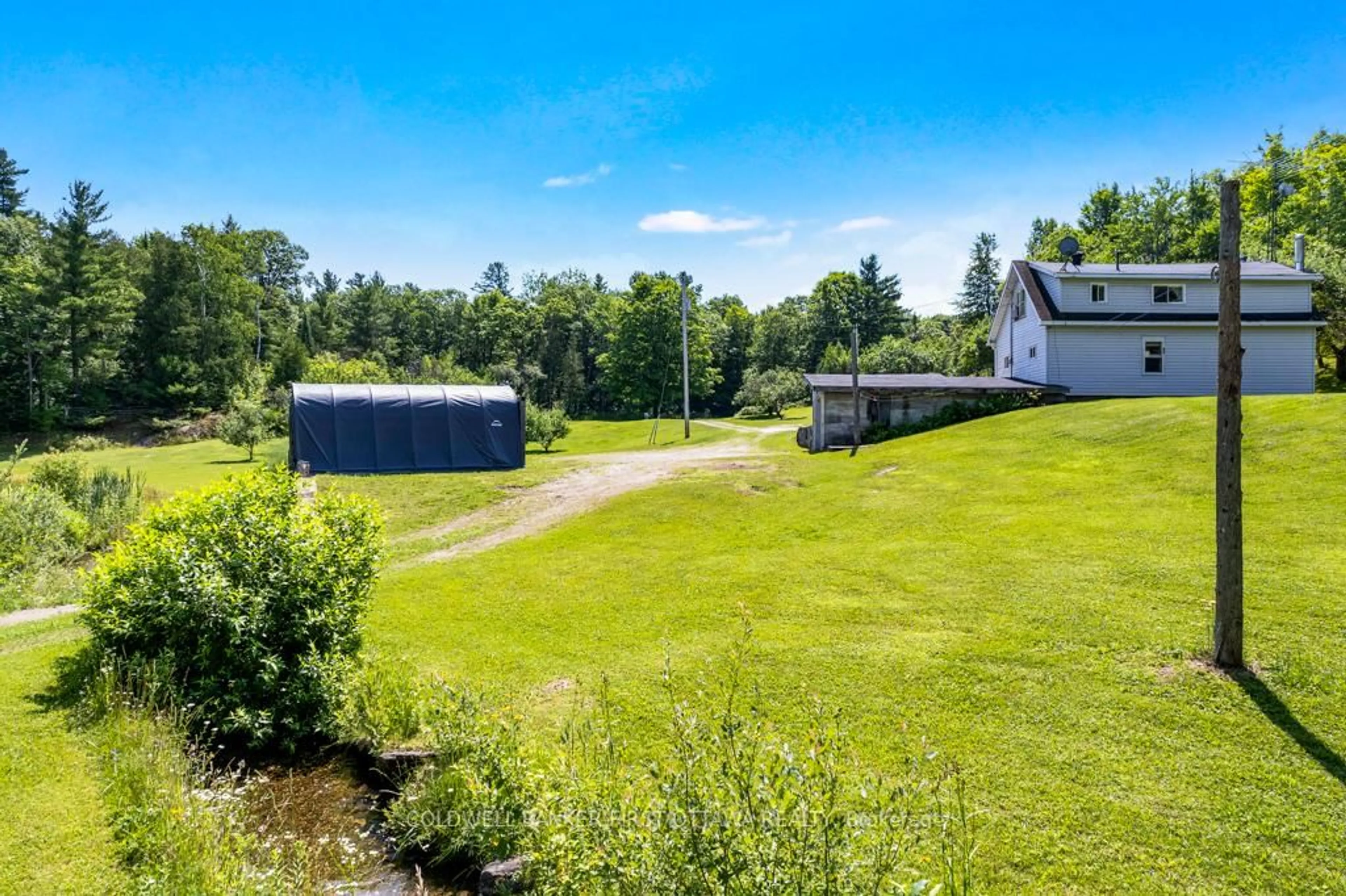 A pic from outside/outdoor area/front of a property/back of a property/a pic from drone, water/lake/river/ocean view for 9252 Highway 511 Rd, Lanark Ontario K0G 1K0