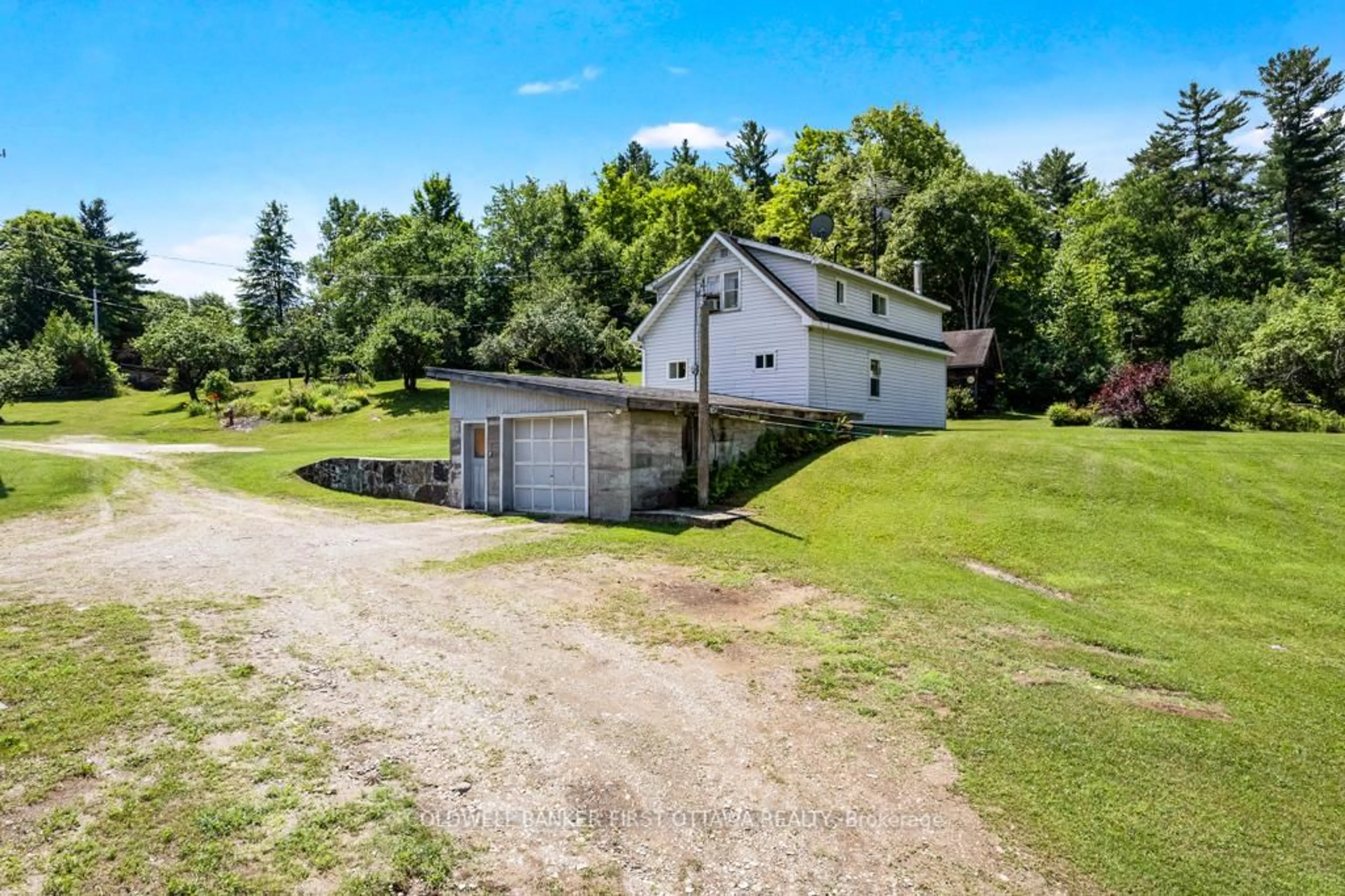 A pic from outside/outdoor area/front of a property/back of a property/a pic from drone, unknown for 9252 Highway 511 Rd, Lanark Ontario K0G 1K0