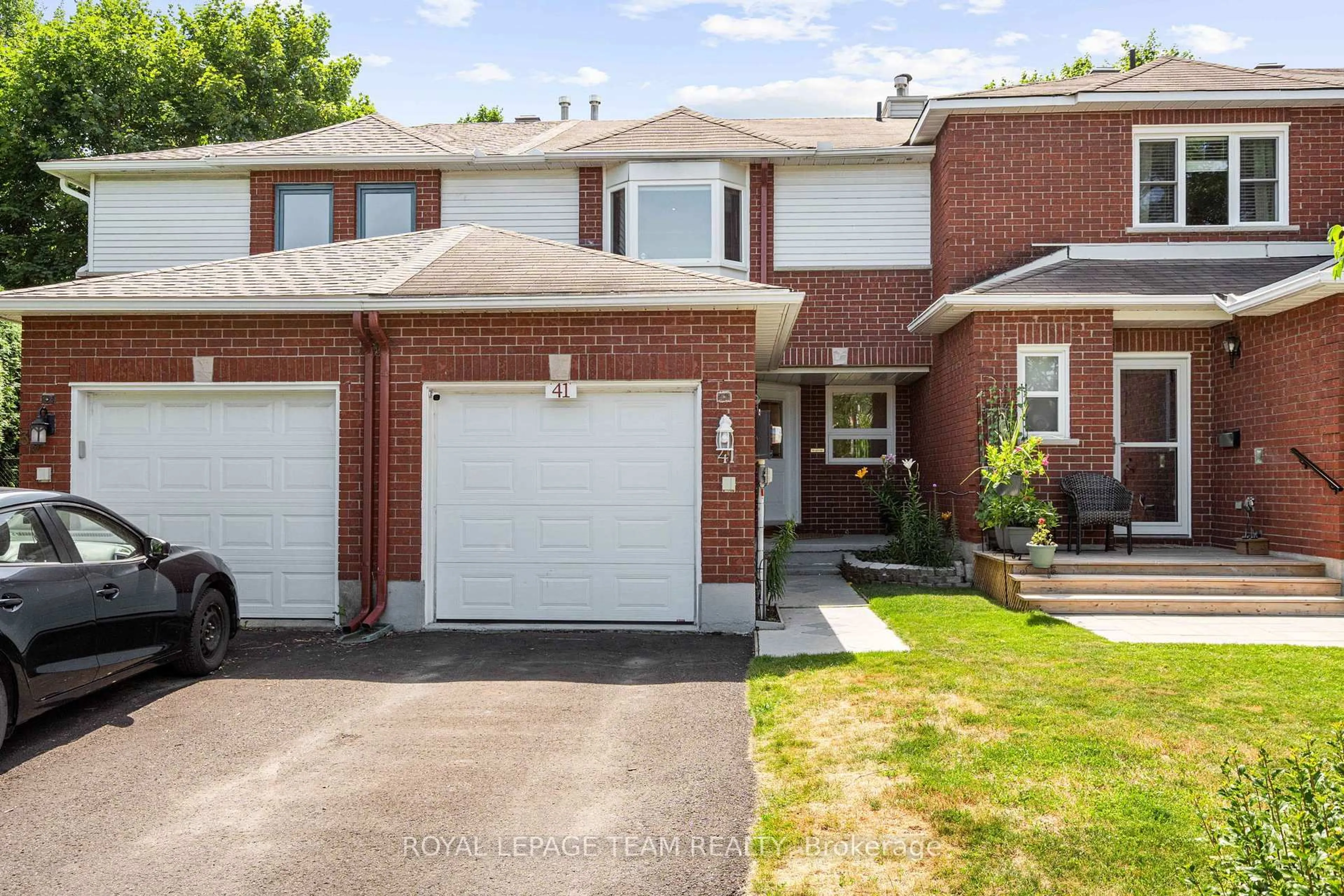 Home with brick exterior material, street for 41 Peterson Pl, Ottawa Ontario K2L 4A8