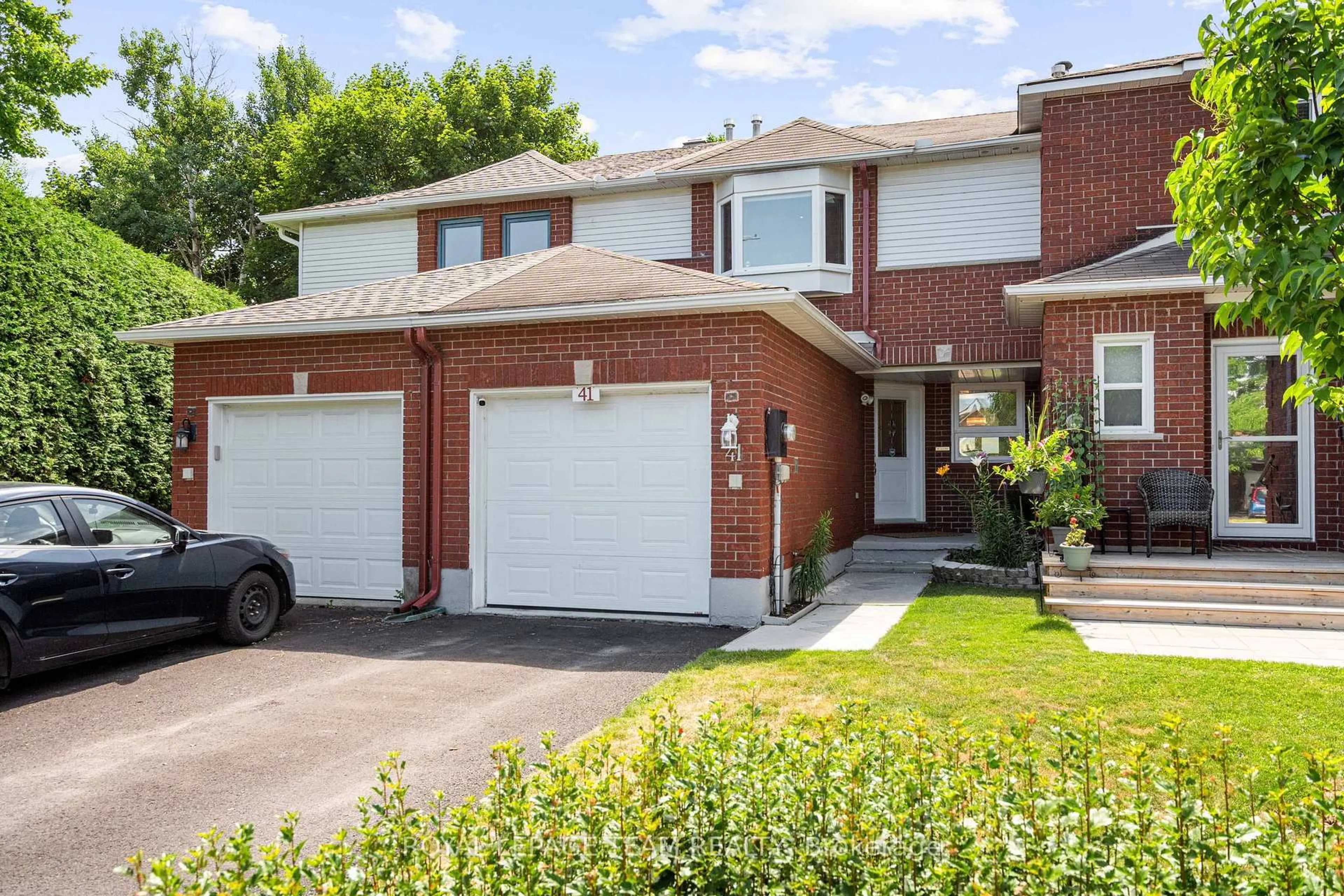 Home with brick exterior material, street for 41 Peterson Pl, Ottawa Ontario K2L 4A8