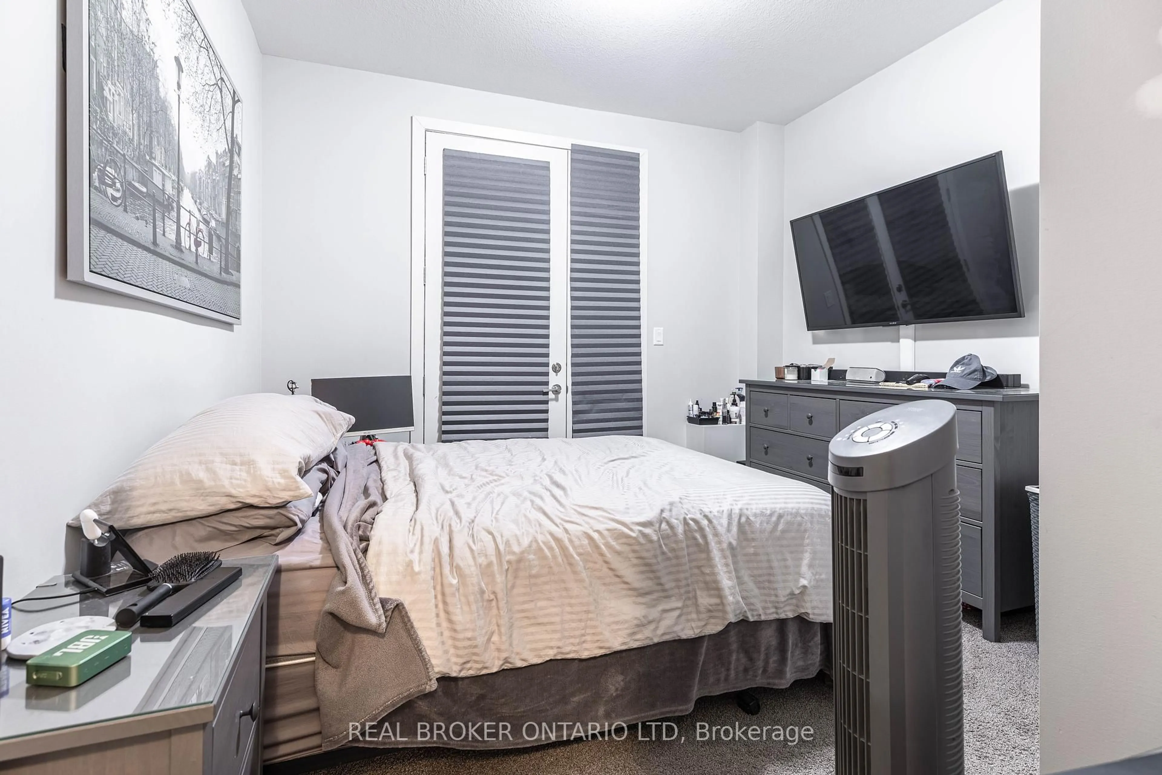 Bedroom with bed, wood/laminate floor for 885 Sarnia Rd, London North Ontario N6H 0J7