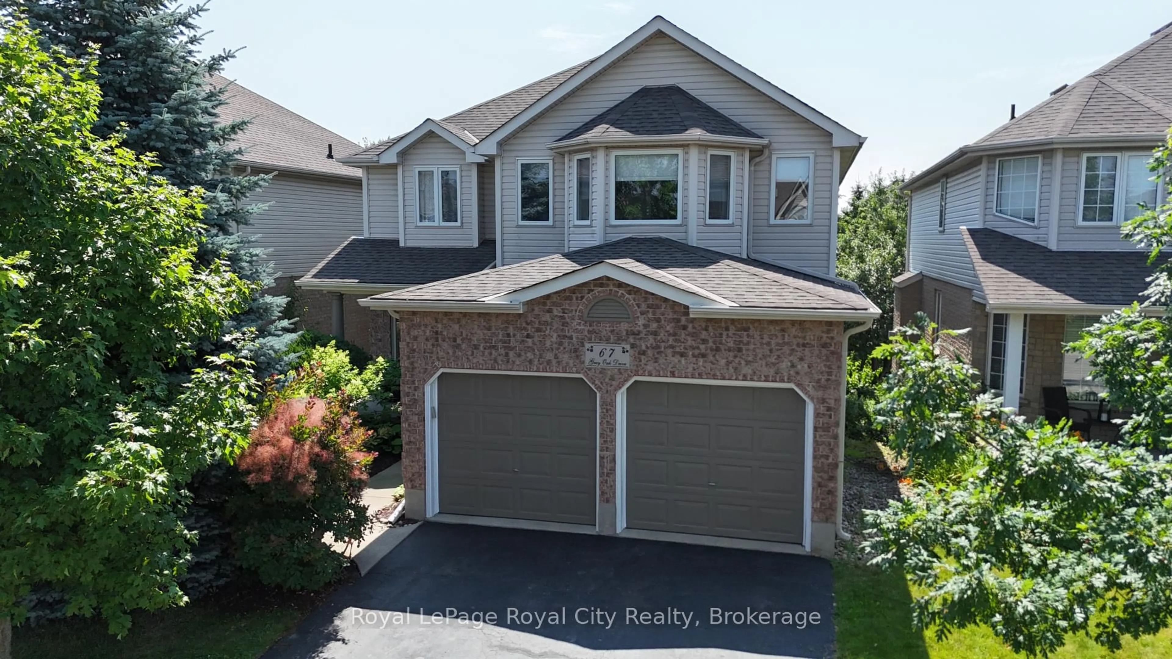 A pic from outside/outdoor area/front of a property/back of a property/a pic from drone, street for 67 Grey Oak Dr, Guelph Ontario N1L 1R2