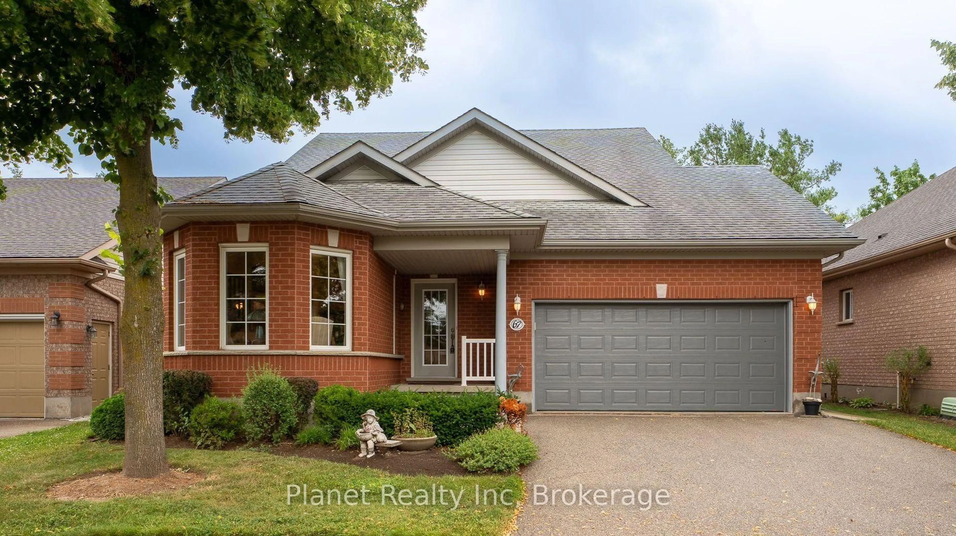 Home with brick exterior material, street for 67 White Pine Way, Guelph Ontario N1G 4X7