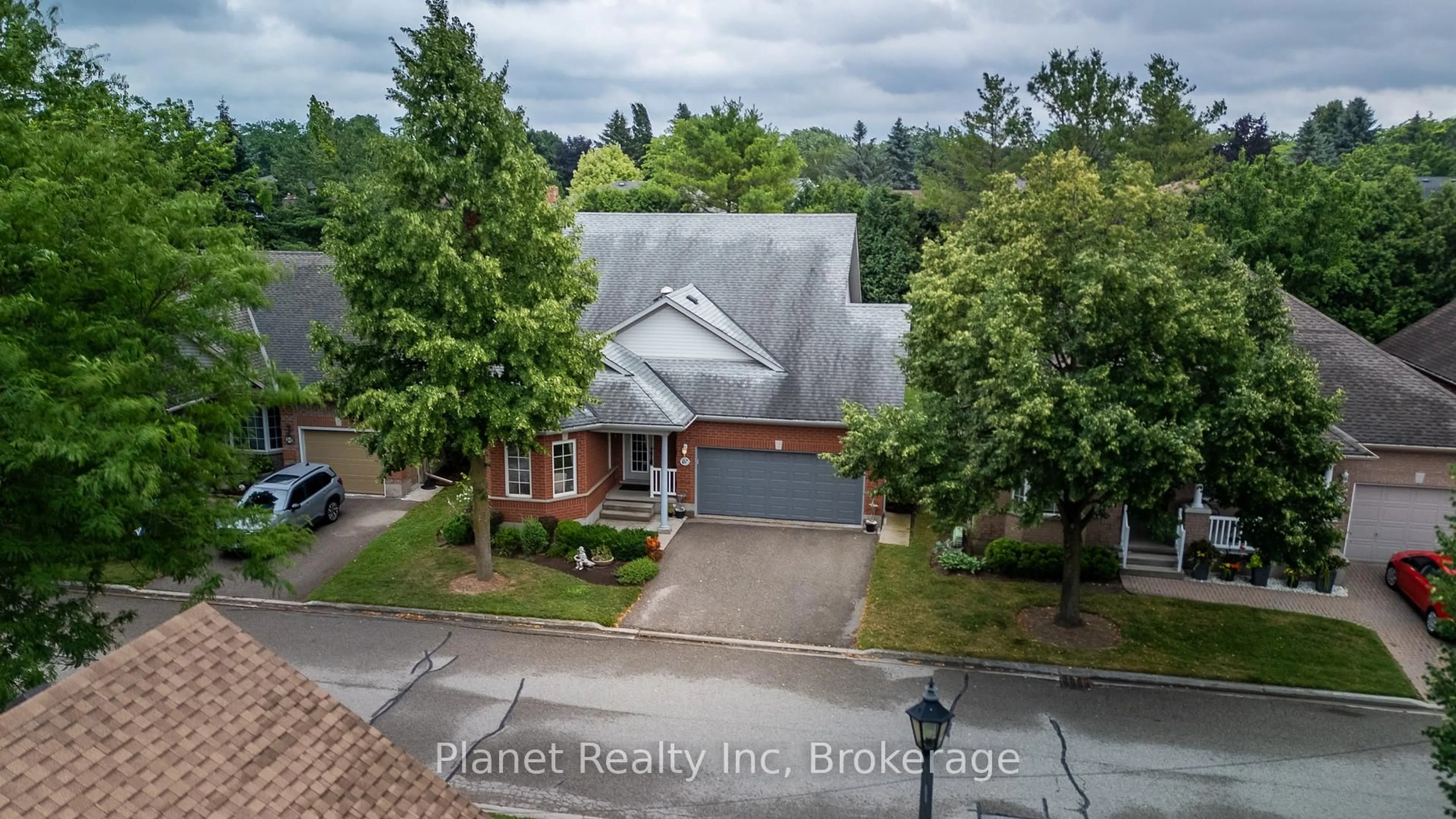 A pic from outside/outdoor area/front of a property/back of a property/a pic from drone, street for 67 White Pine Way, Guelph Ontario N1G 4X7